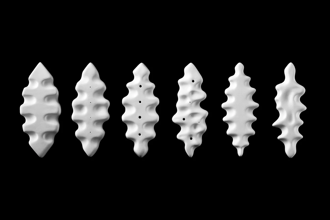 LEAF INTUIGRAMS . 2014. Porcelain. (approx) 8 x 3 x 1/2 in, each 