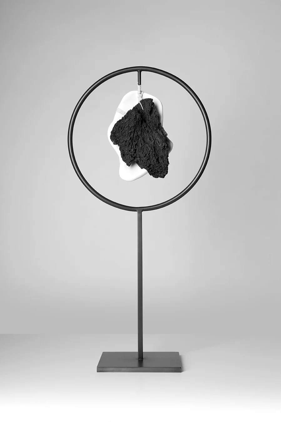 EMBRACE #2 . 2014. Porcelain, wood, metal and string. 22 x 11 x 6 in