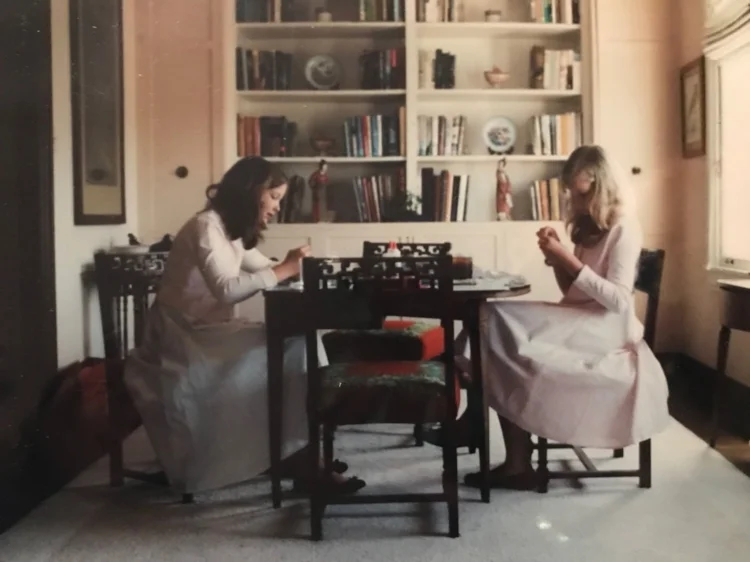 A picture of me and my sister crafting in my grandmother's apartment, circa age 11.