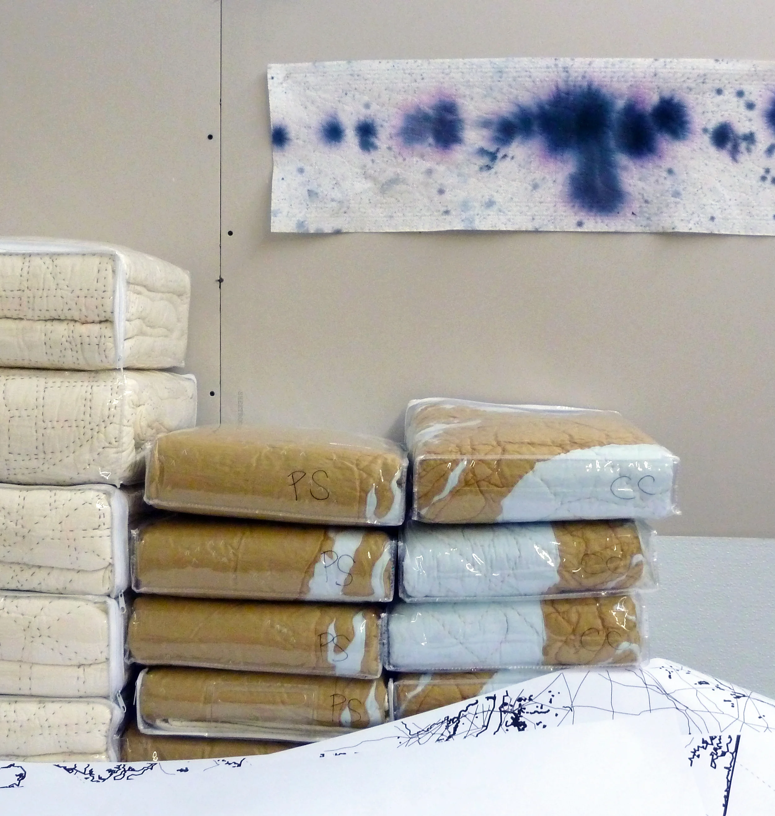 Quilts awaiting shipment to their lucky owners.