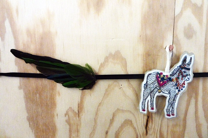 Vestige of the beginning, a milliner wing.