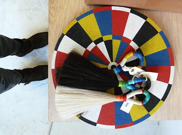Dart board with horse hair tassels.