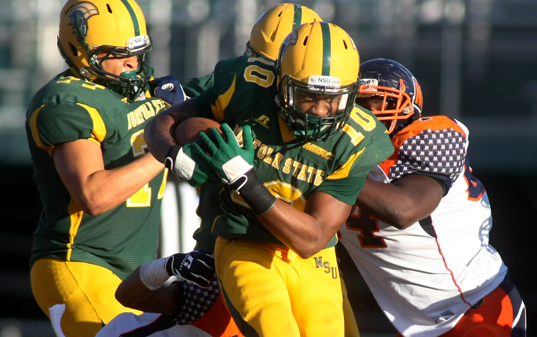 Norfolk State's Brendon Riddick barrels through Morgan State defenders for a first down during NSU's 15-14 win, Saturday, Sept. 27, 2014 at Dick Price Stadium in Norfolk. (Jason Hirschfeld | For The Virginian-Pilot)