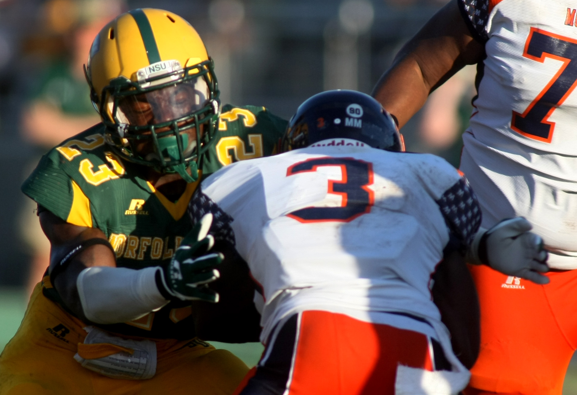 Norfolk State's Marcell Coke, left, tackles Morgan State's Herb Walker, Jr during NSU's 15-14 win, Saturday, Sept. 27, 2014 at Dick Price Stadium in Norfolk. (Jason Hirschfeld | For The Virginian-Pilot)