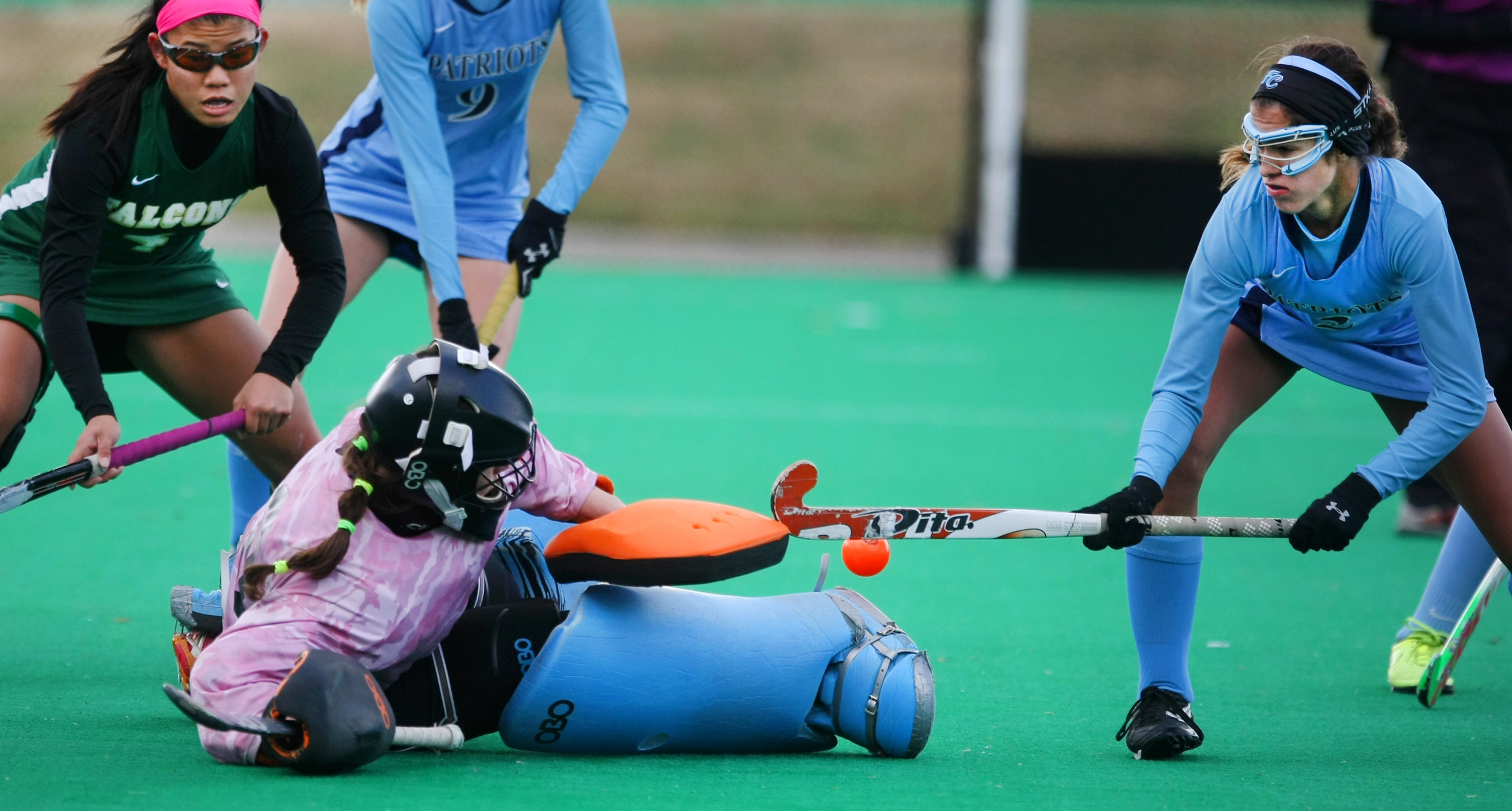 Cox goalkeeper Suzie Pileckas stops a shot by First Colonial's Izzy Fontana, right, during second half action of Cox's 1-0 win to claim their 18th State title, Saturday, Nov. 16, 2014 at the National Training Center in Virginia Beach. (Jason Hirschfeld | For The Virginian-Pilot)