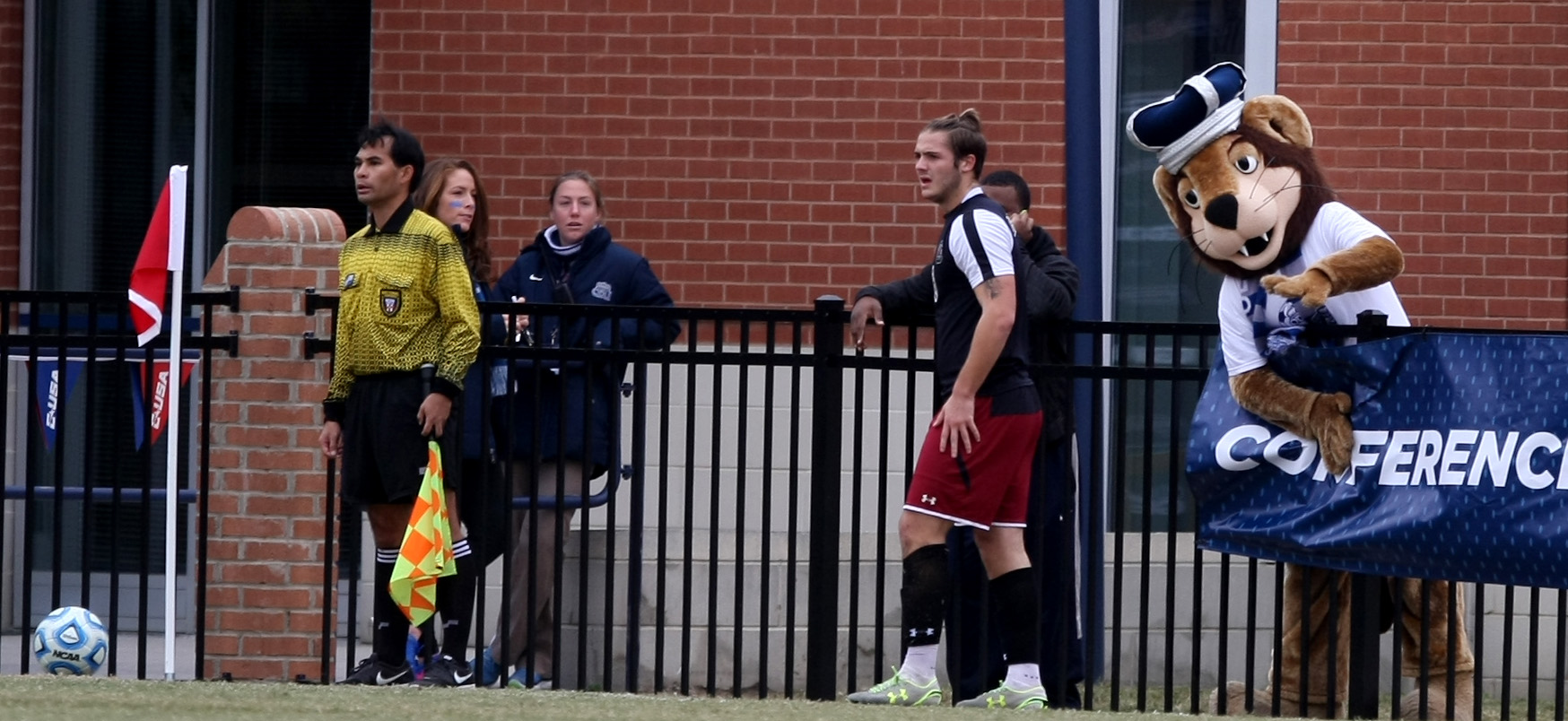 Old Dominion mascot Big Blue tries to distract University of South Carolina's Kurtis Turner during a corner kick in the second half of ODU's 2-1 win over USC to claim the Conference USA Men's Soccer Final, Sunday, Nov. 16, 2014 at ODU in Norfolk. (Jason Hirschfeld | For The Virginian-Pilot)