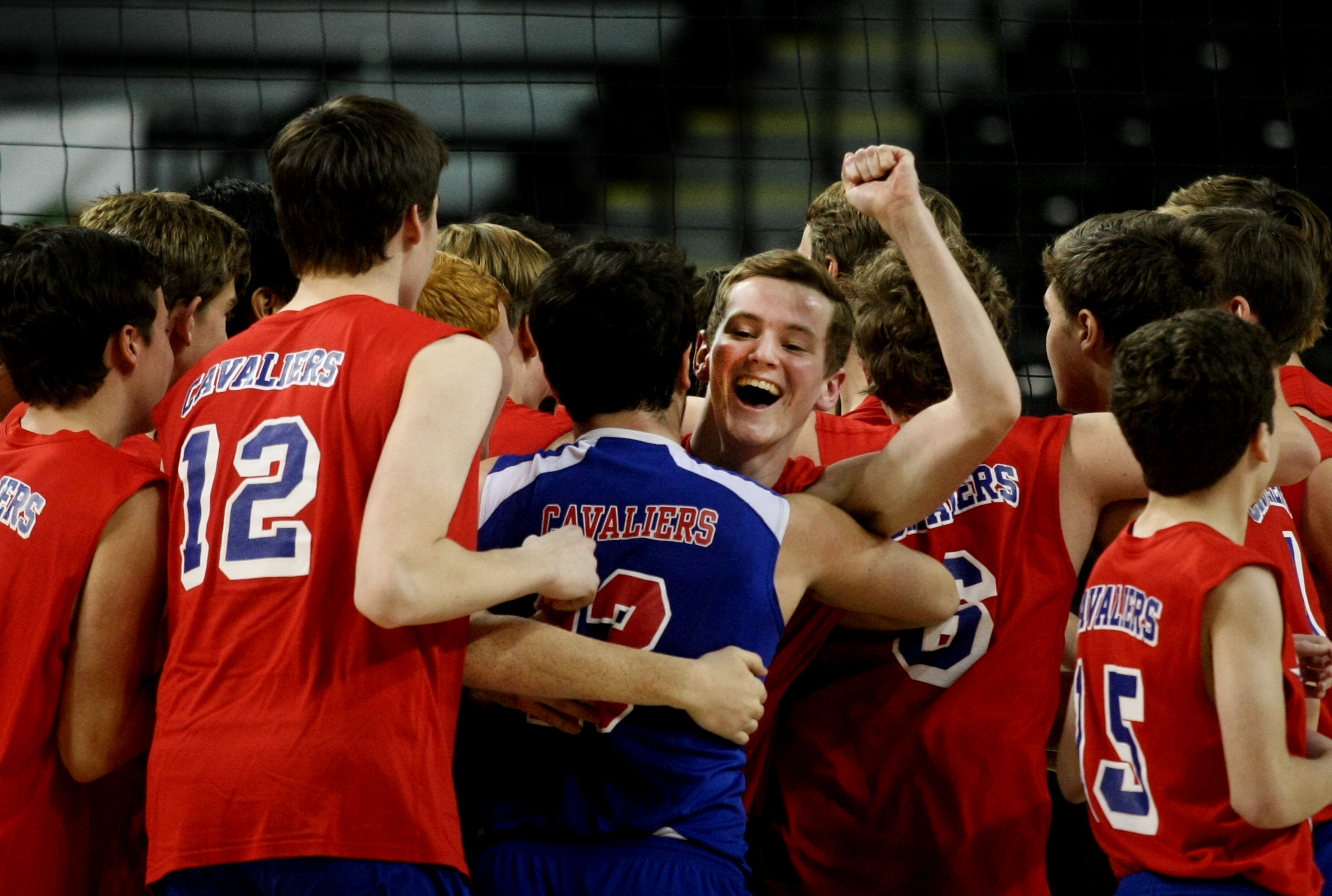 Princess Anne's Noah Banasiewicz celebrates with teammates after winning the Group 5A boys volleyball state championship over Deep Run, Friday, Nov. 21, 2014 at the Siegel Center in Richmond. (Jason Hirschfeld | For The Virginian-Pilot)