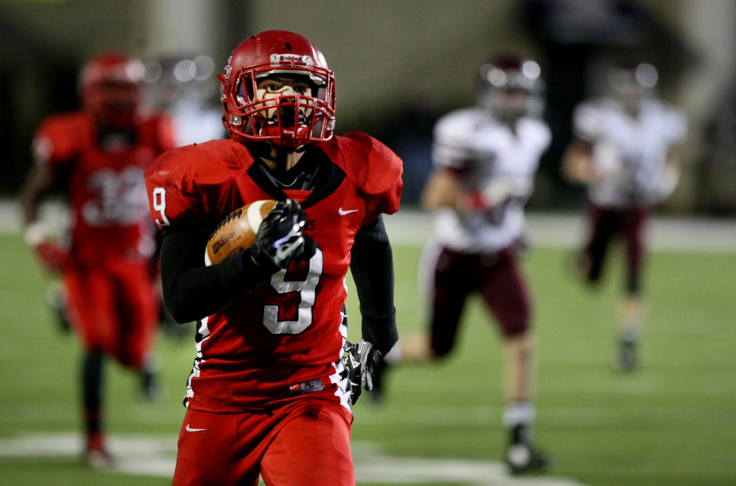 Lake Taylor's Nhyre Quinerly runs for a 42-yard touchdown while beating Salem 41-16 to win the Group 4A South championship, Saturday, Dec. 13, 2014 at Williams Field in Lynchburg. (Jason Hirschfeld | For The Virginian-Pilot)