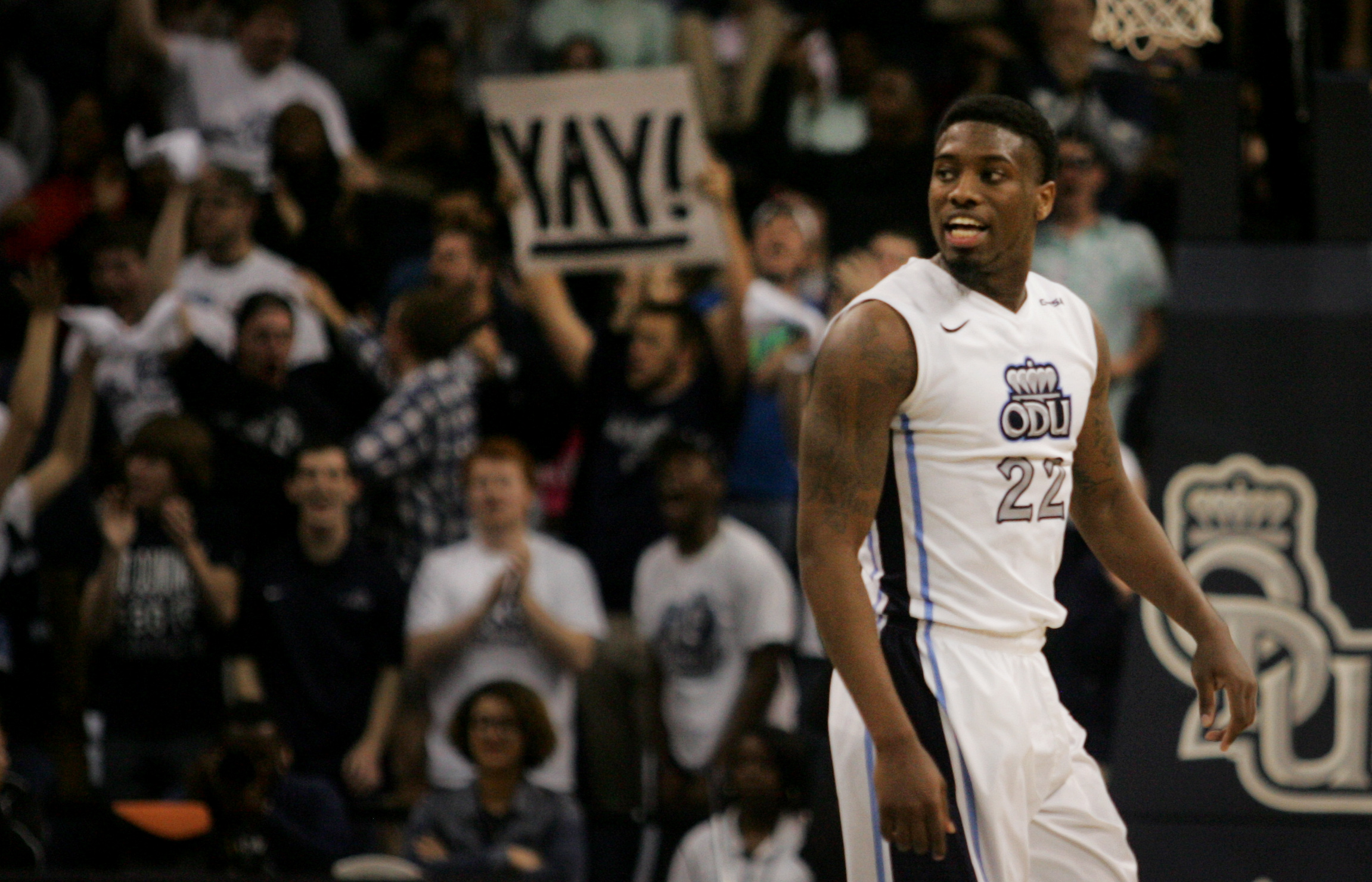Old Dominion's Ambrose Mosley (22) smiles after hitting a three-pointer against Charleston Southern during the second half of an NCAA college basketball game in the National Invitational Tournament, Wednesday, March 18, 2015 in Norfolk, Va. ODU beat Charleston Southern 65-56. (AP Photo/Jason Hirschfeld)