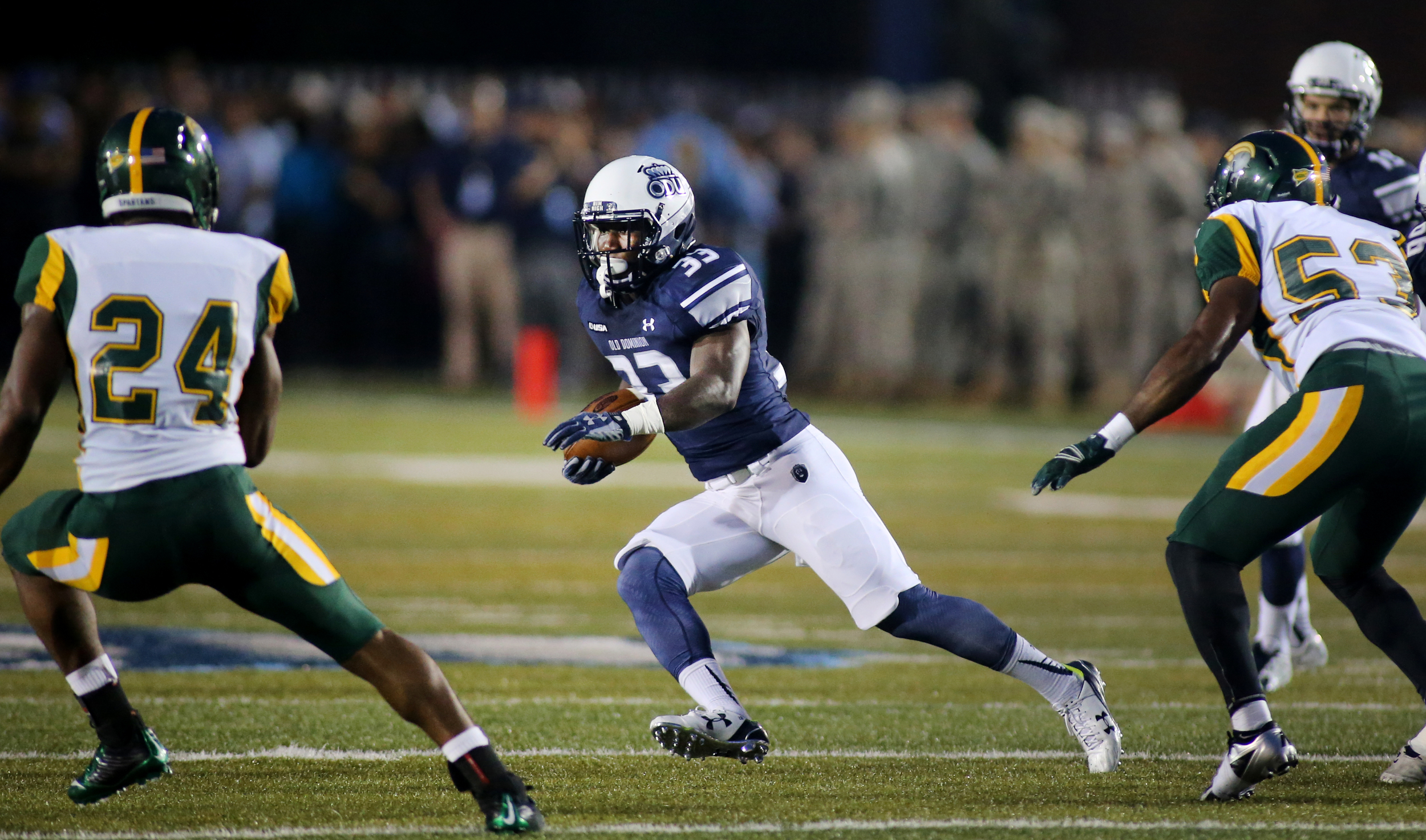 Old Dominion's Ray Lawry splits Norfolk State defenders Jay Anderson, left, and Deon King on a second-quarter reception, Saturday, Sept. 12, 2015 at Foreman Field in Norfolk. 