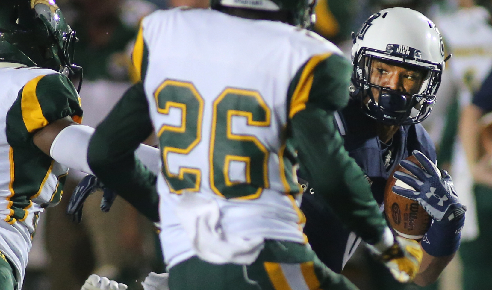 Old Dominion's Jonathan Duhart eyes Norfolk State defenders on his way to a first-quarter gain, Saturday, Sept. 12, 2015 at Foreman Field in Norfolk.