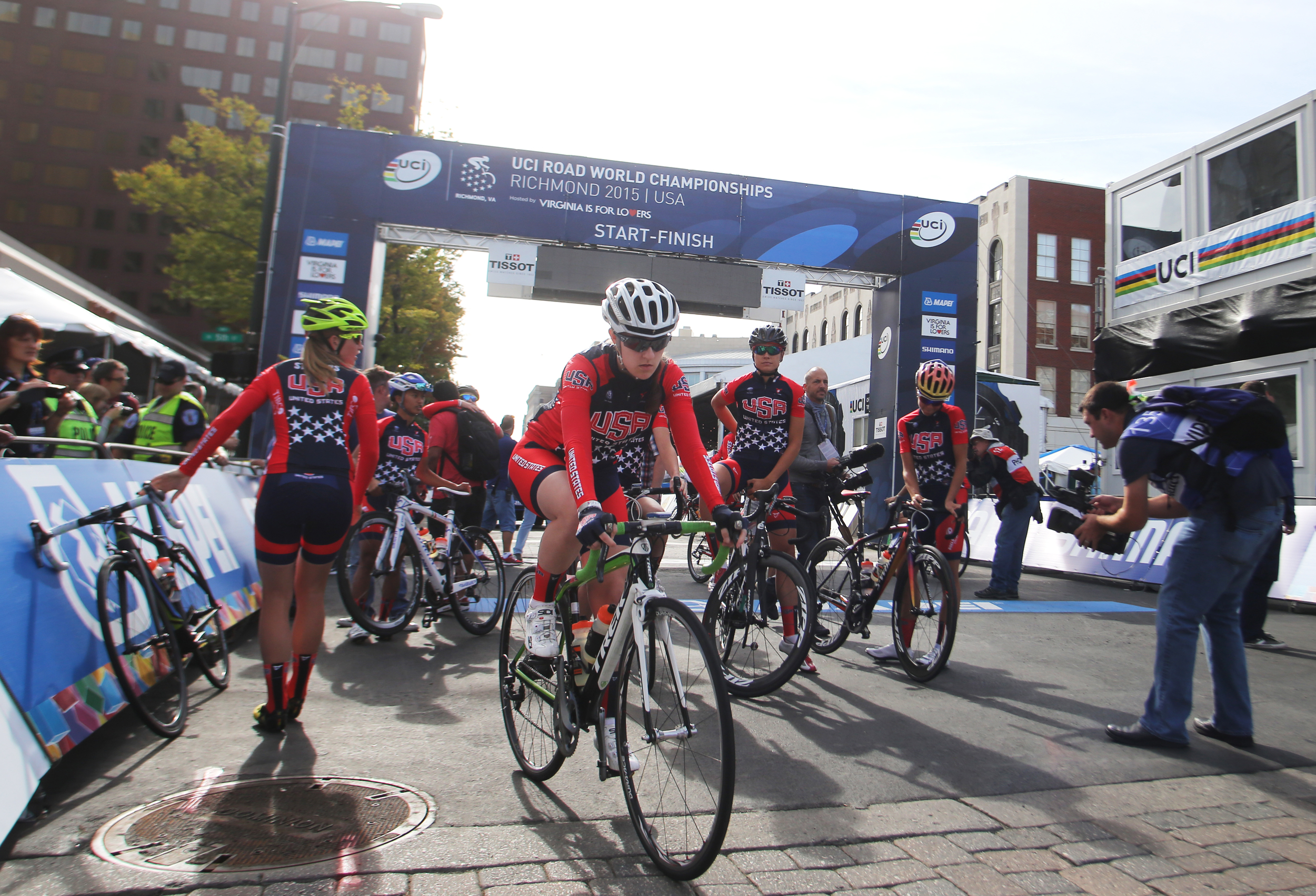 Members of the USA cycling team head out for the Road Circuit Training portion of the UCI Road World Championships cycling races in Richmond, Va., Thursday, Sept. 24, 2015. (AP Photo/Jason Hirschfeld)