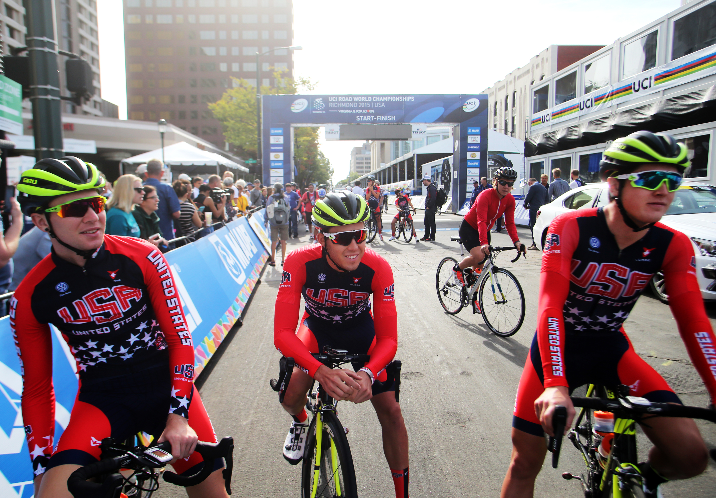 USA cyclists Logan Owen, left, Daniel Eaton, center and Greg Daniels before heading out for the Road Circuit Training portion of the UCI Road World Championships cycling races in Richmond, Va., Thursday, Sept. 24, 2015. (AP Photo/Jason Hirschfeld)