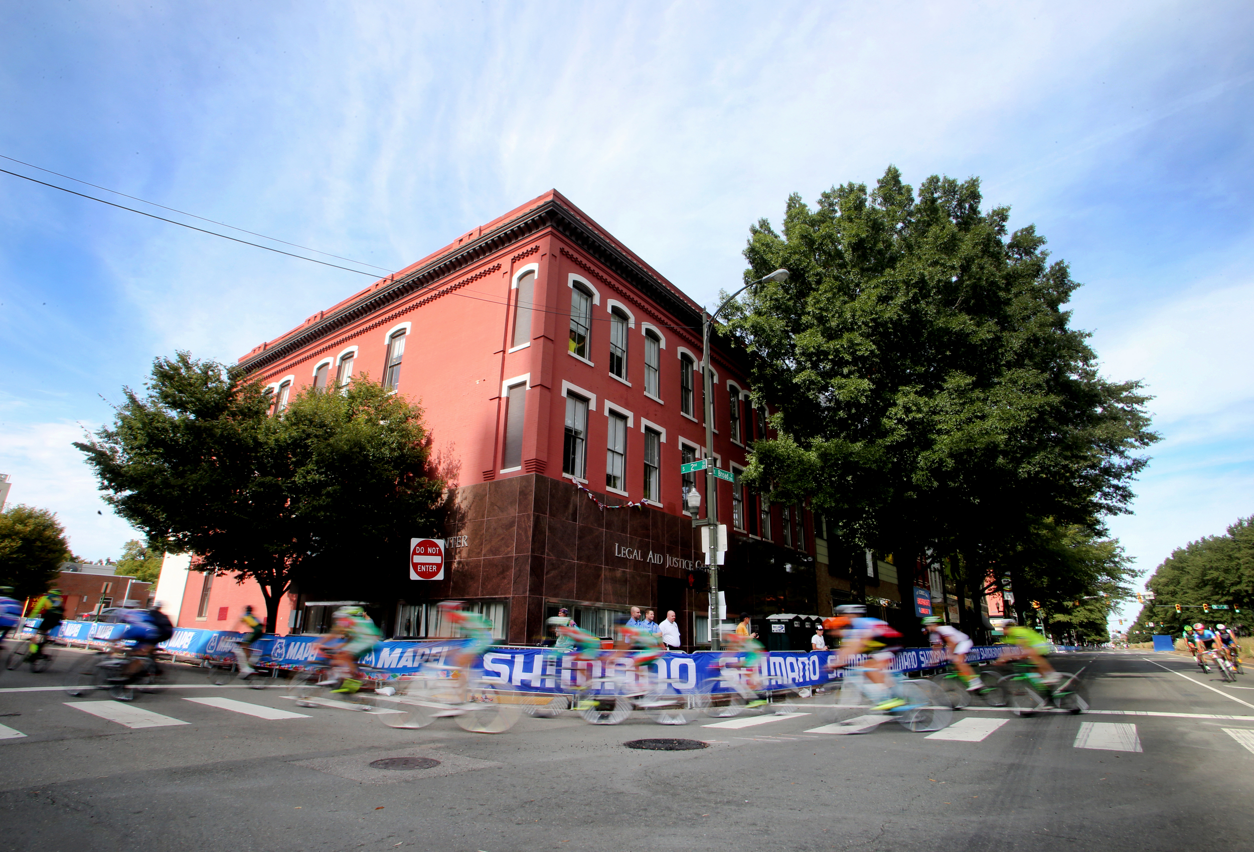 Cyclists ride in the Road Circuit Training portion of the UCI Road World Championships cycling races in Richmond, Va., Thursday, Sept. 24, 2015. (AP Photo/Jason Hirschfeld)