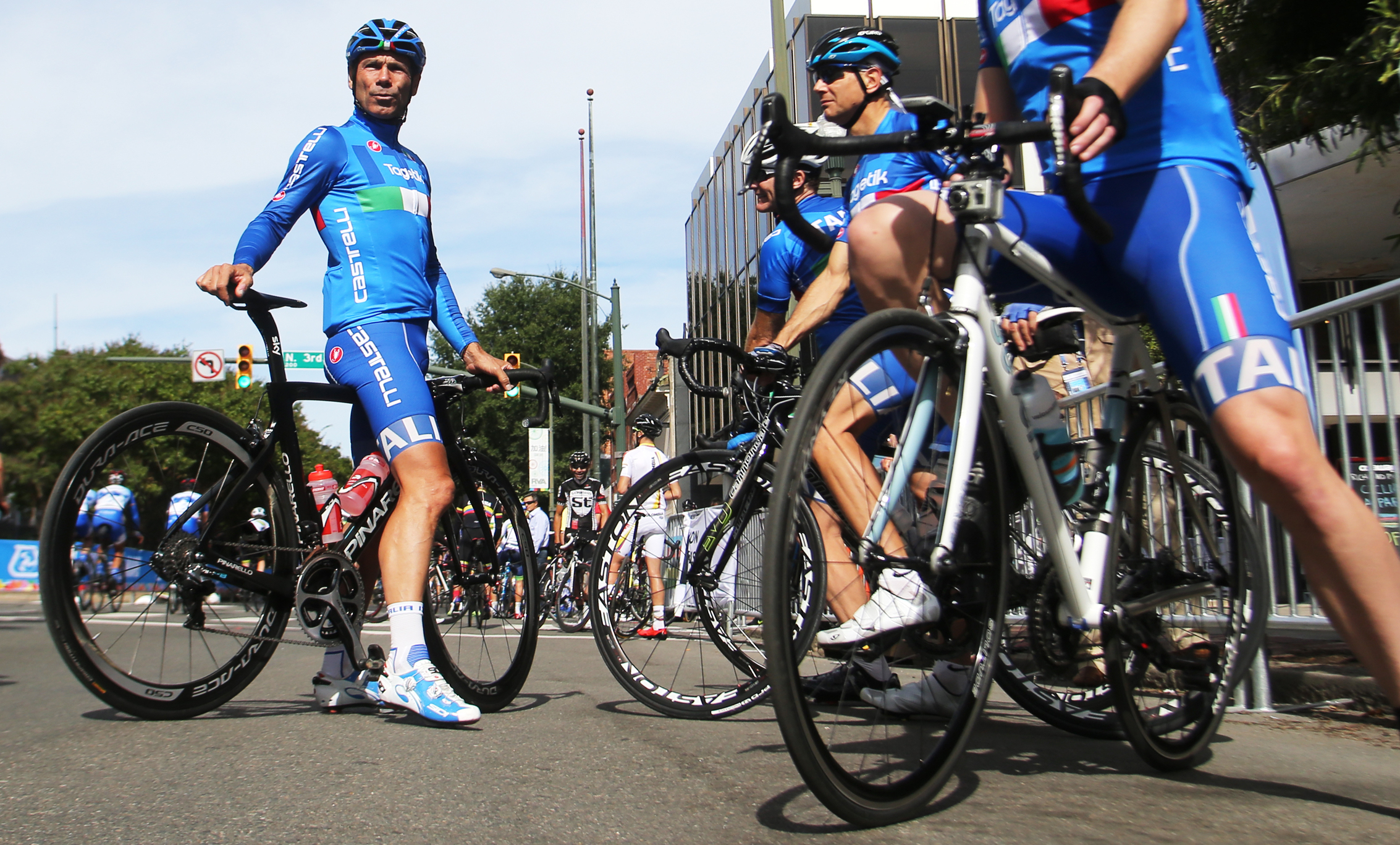 Members of the Italian cycling team take a break during he Road Circuit Training portion of the UCI Road World Championships cycling races in Richmond, Va., Thursday, Sept. 24, 2015. (AP Photo/Jason Hirschfeld)