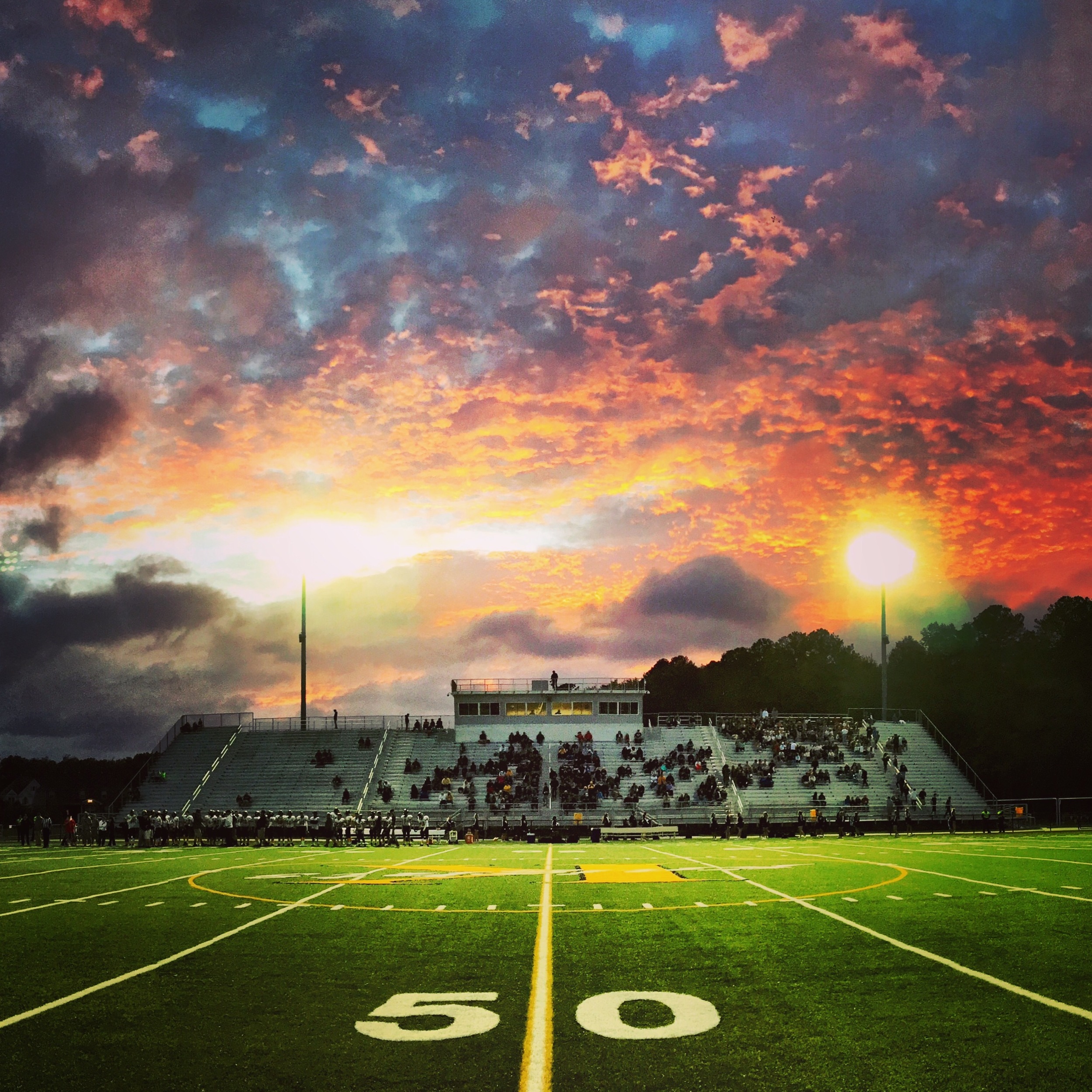 A dynamic sunset is pictured before kickoff.