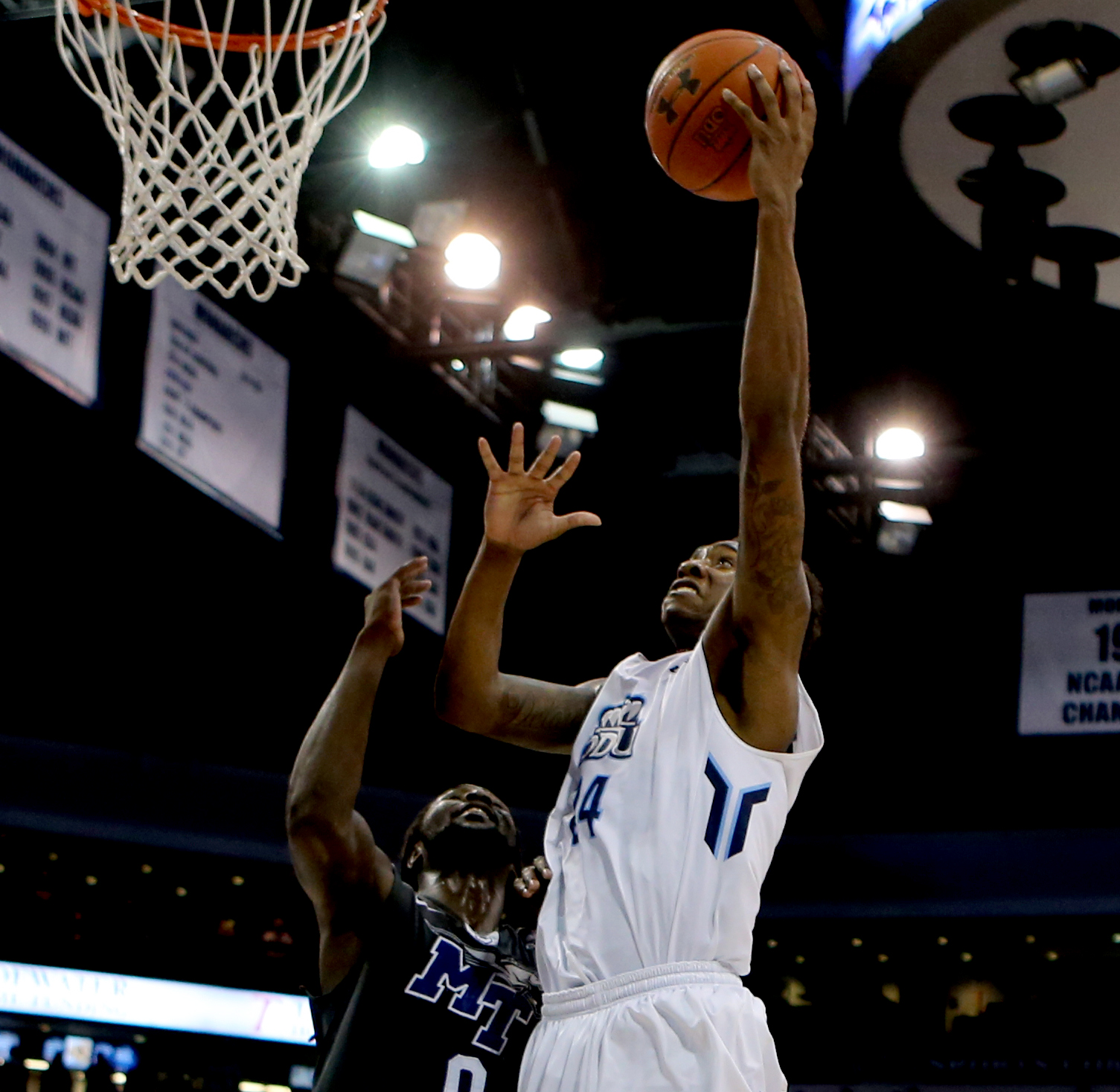Old Dominion's Zoran Talley, right, shoots over Middle Tennessee's Darnell Harris in the first half of ODU's 64-61 loss, Saturday, Jan. 16, 2016 at the Constant Center in Norfolk. (Jason Hirschfeld | For The Virginian-Pilot)