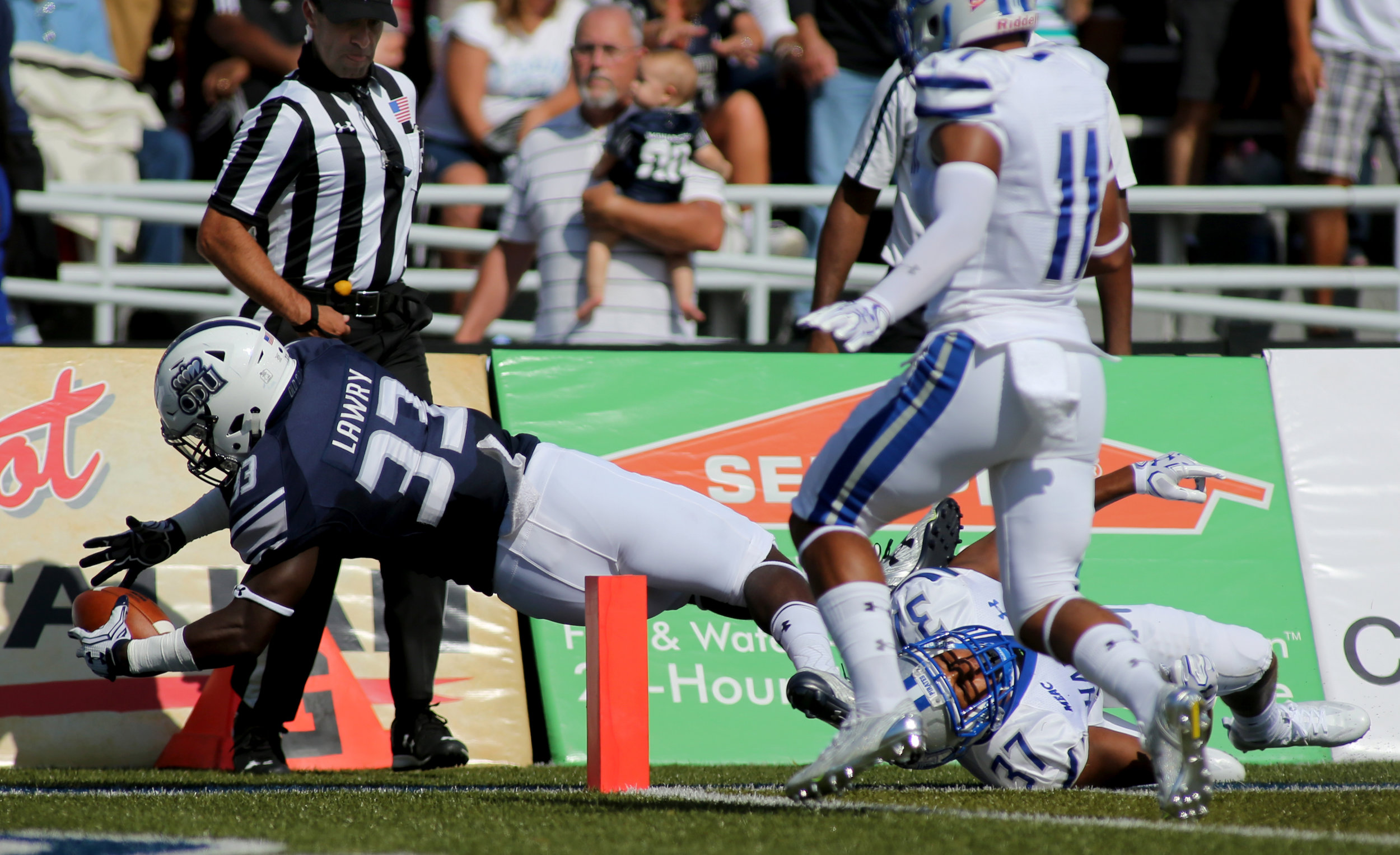 Old Dominion's Ray Lawry dives across the pylon for a first half touchdown over Hampton, Sunday, Sept. 4, 2016 at Foreman Field in Norfolk. (Jason Hirschfeld | The Virginian-Pilot)