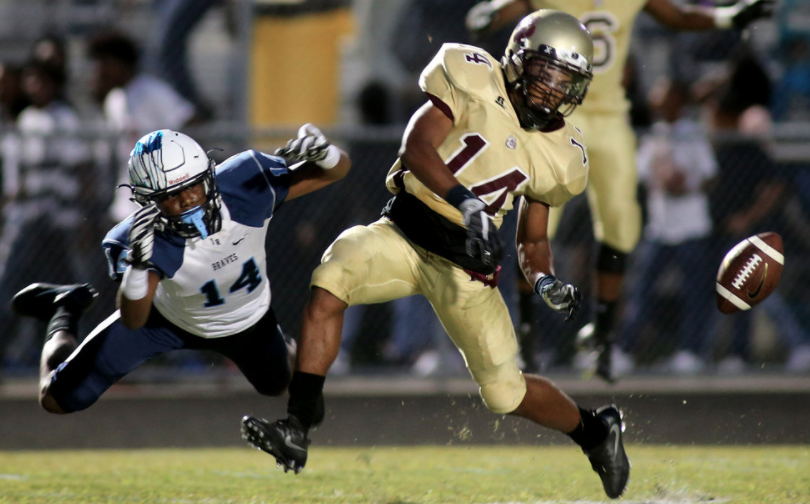 King's Fork's Bryan Walker, right, breaks up a pass intended for Indian River's Johnathan Griffin, Friday, Sept. 16, 2016 at King's Fork High School in Suffolk. 