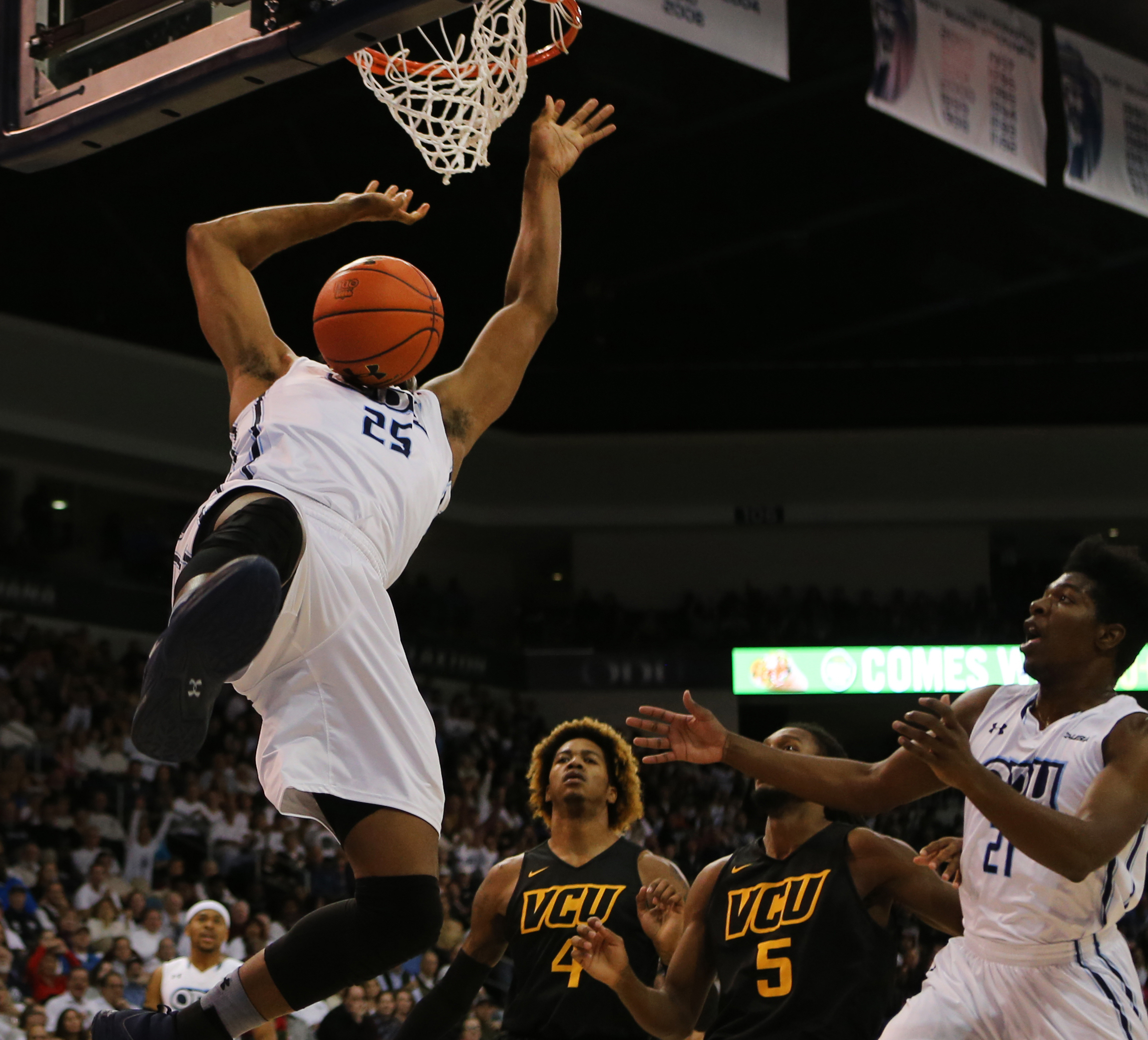 Old Dominion's Brandan Smith dunks in the first half against VCU, Saturday, Dec. 10, 2016 at the Constant Center in Norfolk. (Jason Hirschfeld | The Virginian-Pilot)
