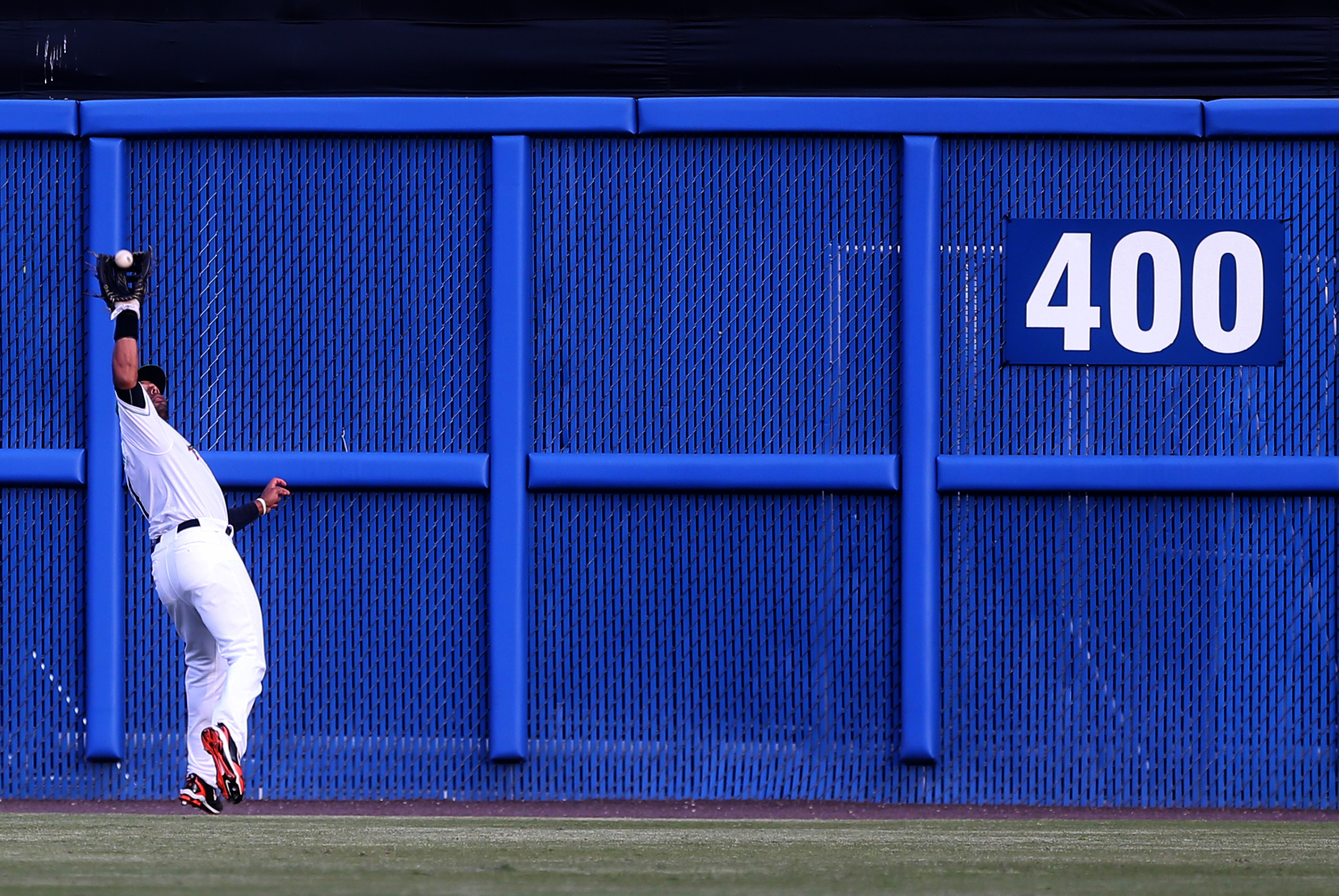 Tides centerfielder Chris Dickerson hauls in a fly ball off the bat of Gwinnett's Ozzie Albies in the first inning of their 8-2 loss, Wednesday, April 12, 2017 at Harbor Park in Norfolk. 