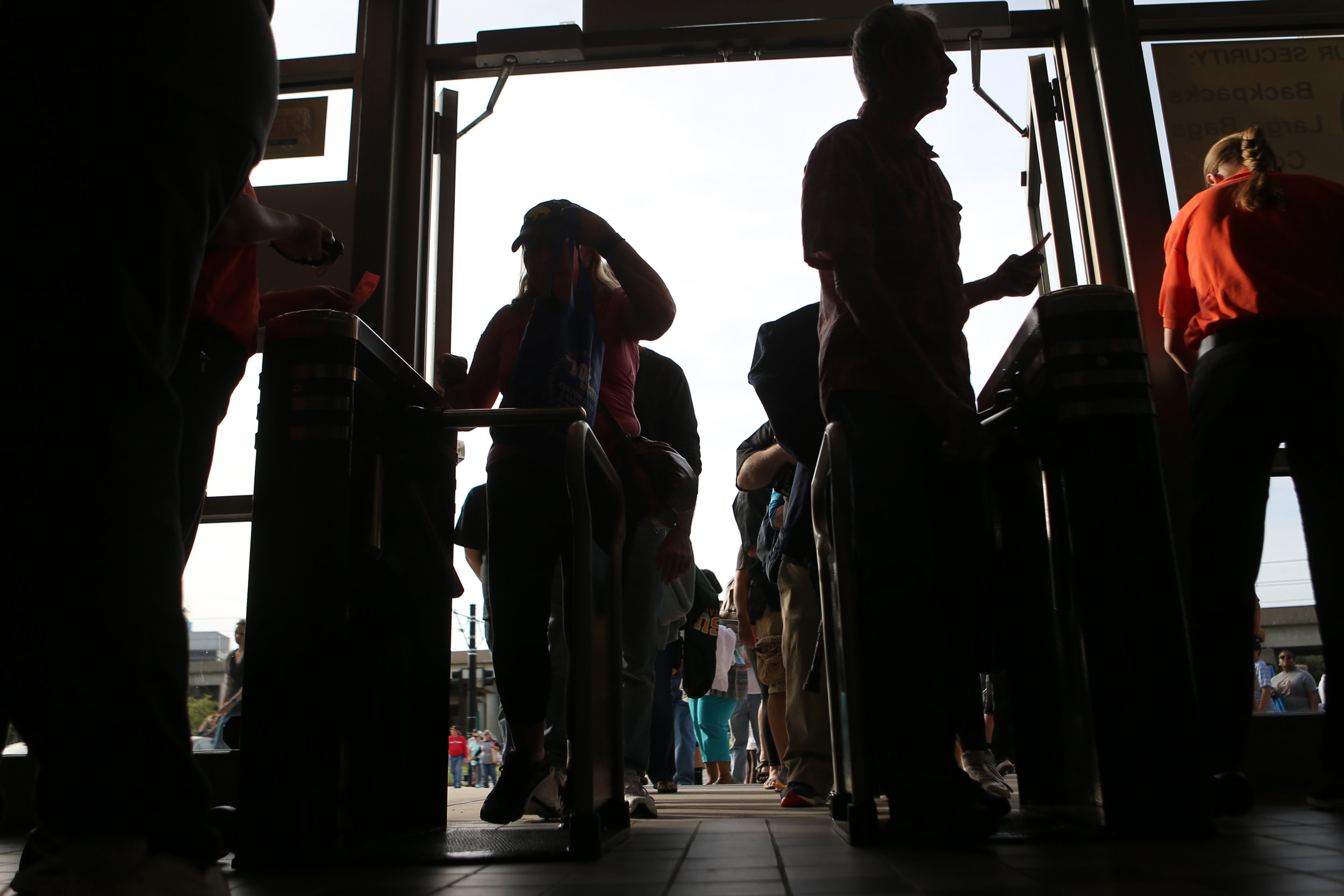 Fans go through the turnstiles on the Tides' Opening Night 3-0 win over Gwinnett, Monday, April 10, 2017 at Harbor Park in Norfolk. 