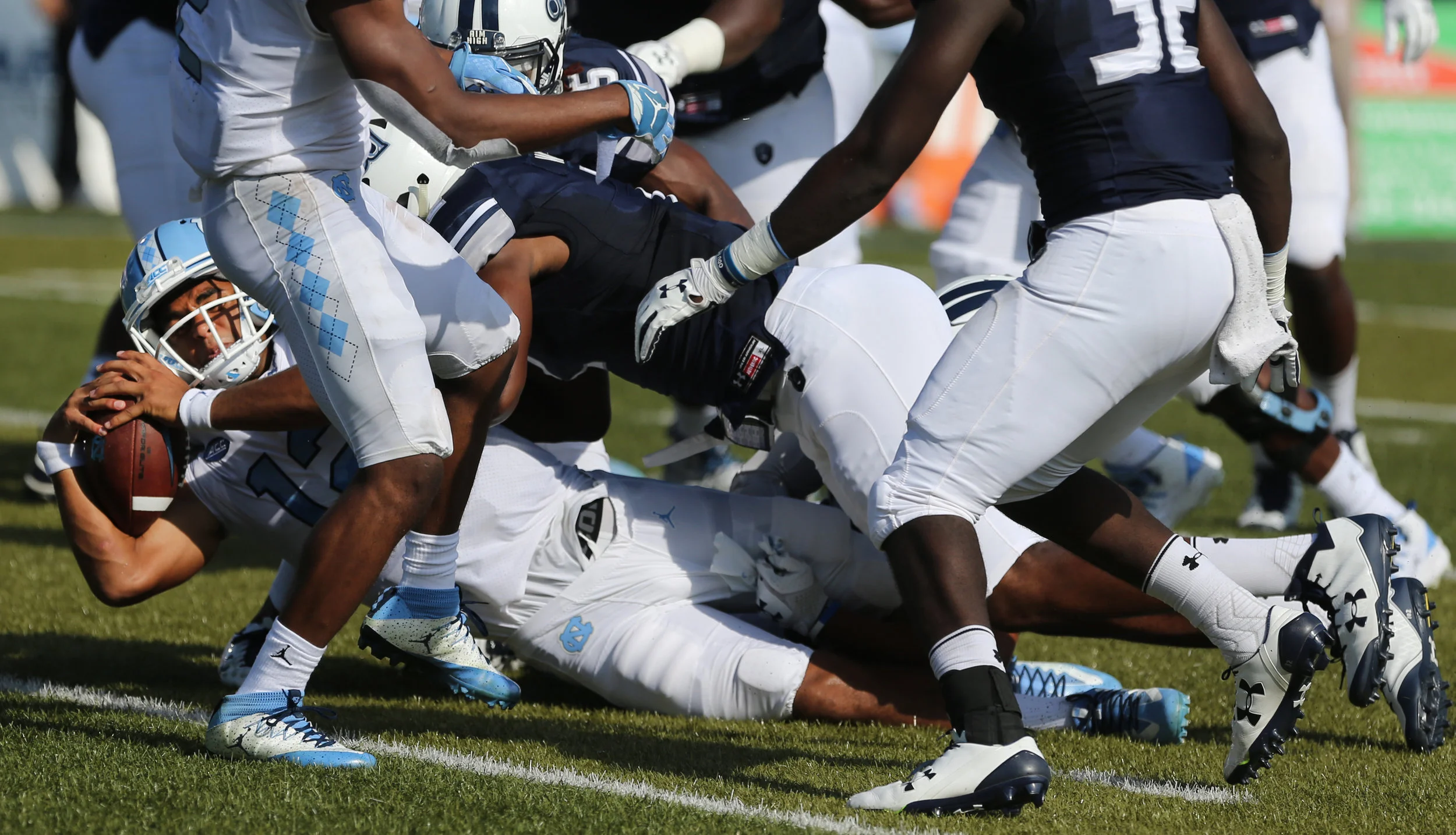 UNC's Chazz Surratt (12) scores a touchdown as the ball crosses the plane during the first half of an NCAA college football game Old Dominion, Saturday, Sept. 16, 2017 in Norfolk, Va.