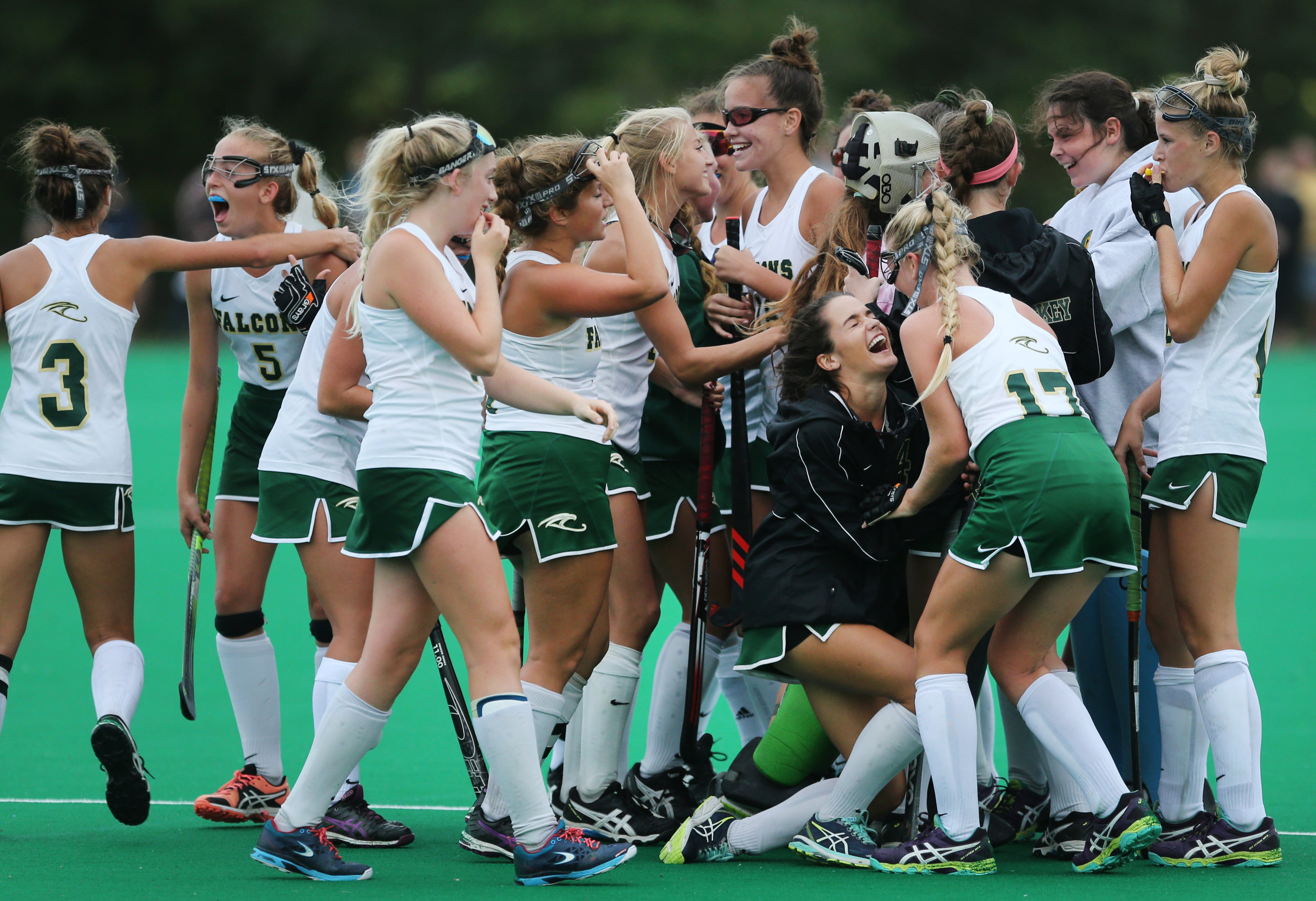 Cox teammates celebrate their 2-1 upset over No. 2 First Colonial, Thursday, Oct. 12, 2017 at the National Training Center in Virginia Beach. 