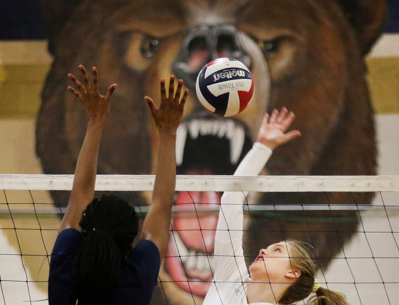 Grassfield's Erika Anderson, right, hits a winner past Western Branch's Michelle Debroux during the Grizzlies' 3-0 sweep, Thursday, Oct. 19, 2017 at Western Branch High School in Chesapeake.