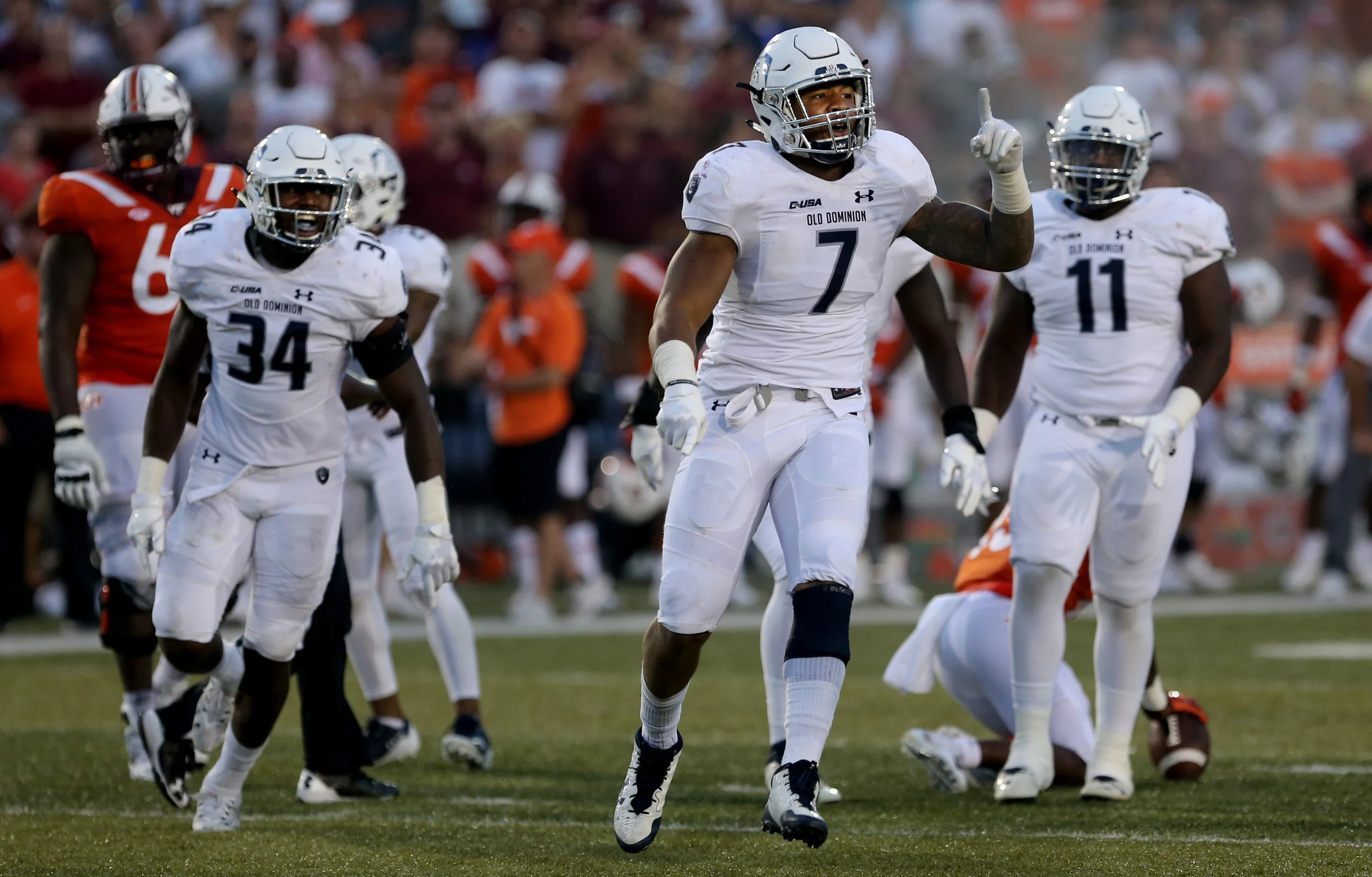Old Dominion's Oshane Ximines reacts after a first down during the second half of an NCAA college football game, Saturday, Sept. 22, 2018, in Norfolk, Va. Old Dominion won 49-35. (AP Photo/Jason Hirschfeld)