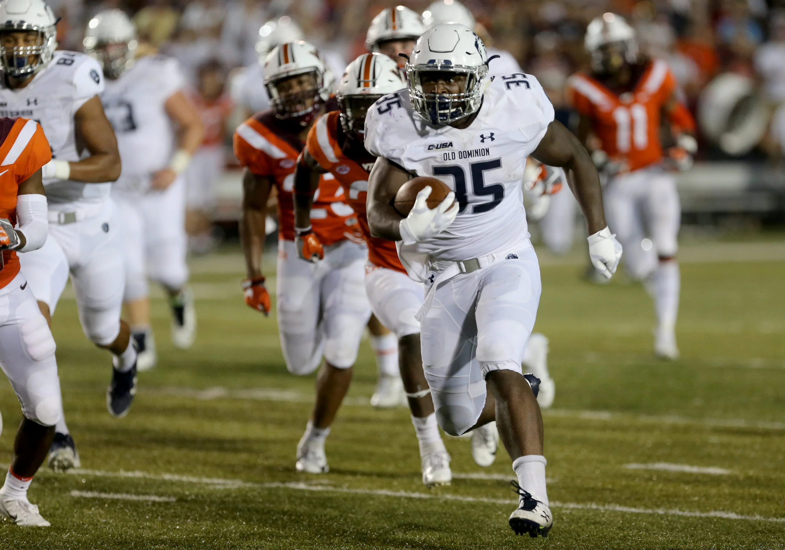 Old Dominion's Jeremy Cox runs for a touchdown against Virginia Tech during the second half of an NCAA college football game Saturday, Sept. 22, 2018, in Norfolk, Va. Old Dominion won 49-35. (AP Photo/Jason Hirschfeld)