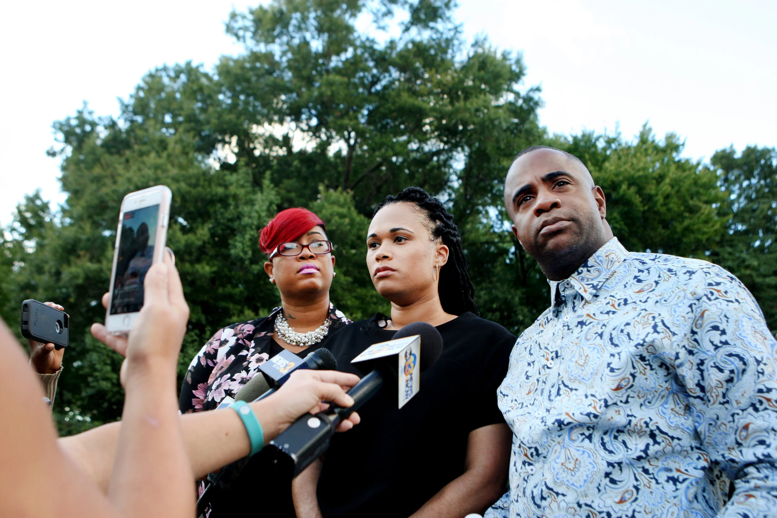 The family of Ashanti Billie, including family spokeswoman Kimberly Wimbish, left, address the media in Virginia Beach.