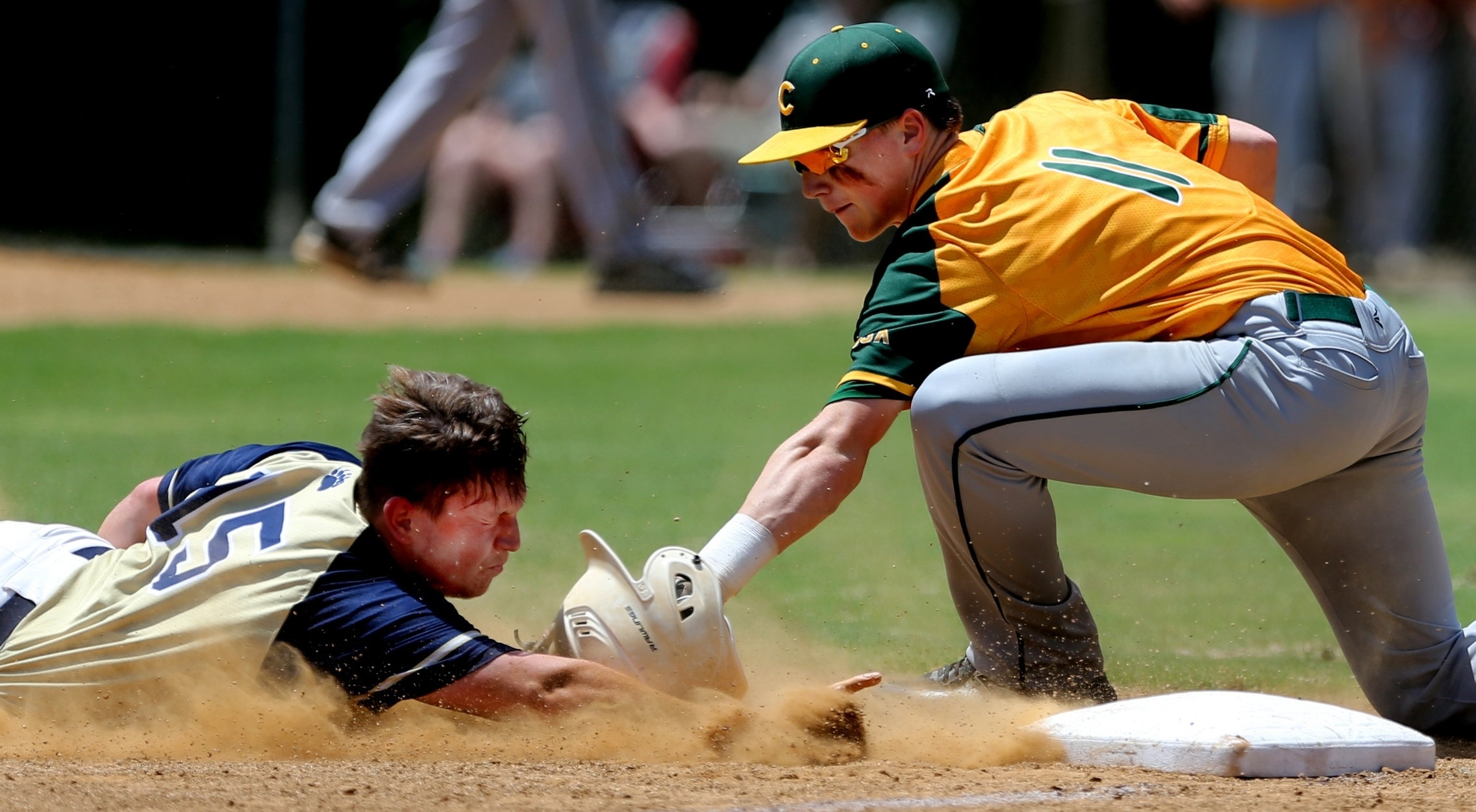 Western Branch's Connor Epley slides safely into third base ahead of the tag by Cox's South Trimble.