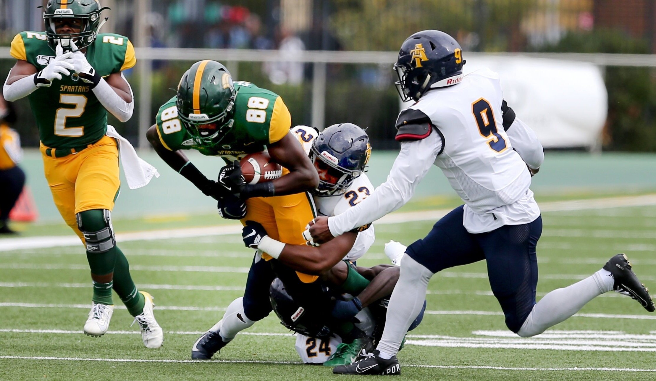 Norfolk State's Marcque (cq) Ellington drags the North Carolina A&T defense during first half action of the Spartan's 58-19 loss, Saturday, October 5, 2019, Saturday, 58-19 at Dick Price Stadium in Norfolk.