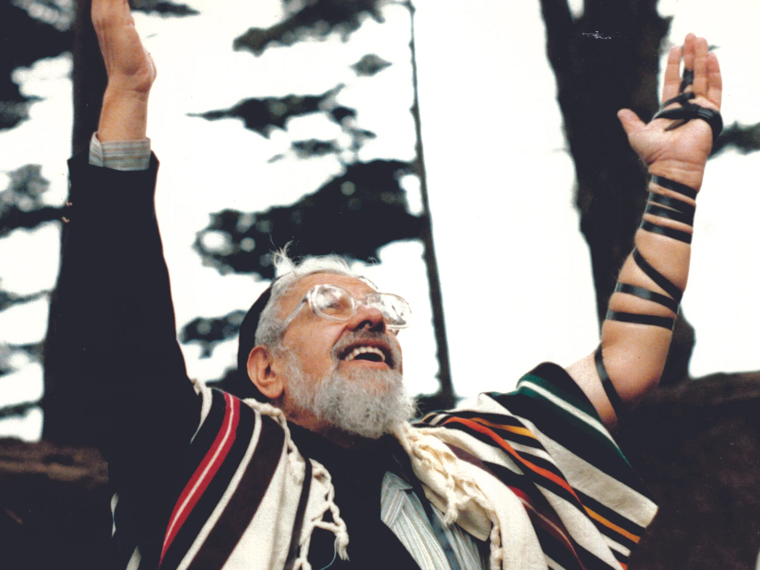 “Reb Zalman in celebratory prayer at Baker’s Beach, California.” Photo credit: Yehudit Goldfarb, 1987.