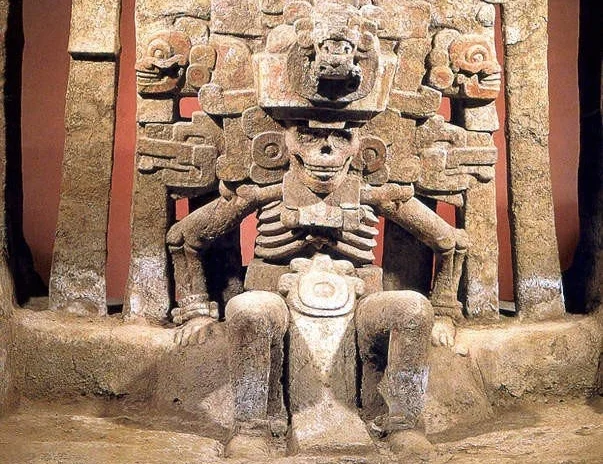 The Lady of the Dead in Mictlan, the Aztec underworld, Mictlancihuatl (Mikt-lan-see-watl). Image from "Mictlán: el lugar de los muertos" by Luz Espinosa.