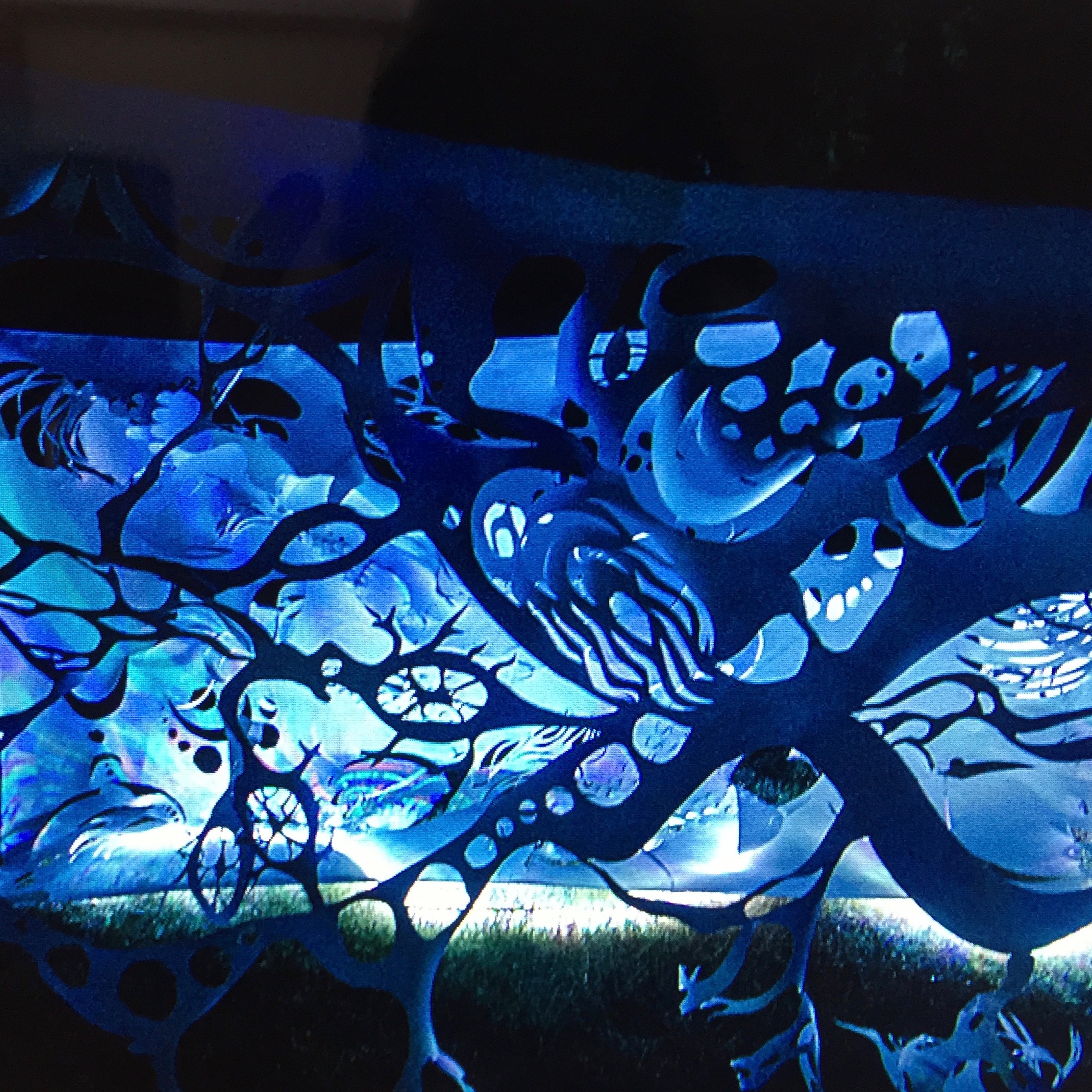 Illuminated papercut scroll by Masha Lopes. Photo by Din Dins.