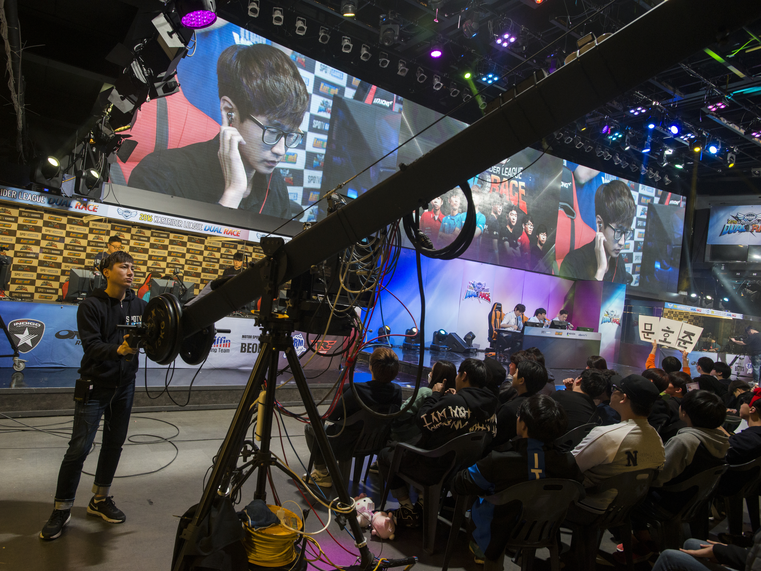  Seoul, 2016.  Korea is the cradle of e-sports which have now become popular worldwide, with crowds gathering to watch video gamers compete on big screens.   In Seoul’s Gangnam district, the Nexon Arena hosts a live SPOTV Games broadcast of a Dual Ra