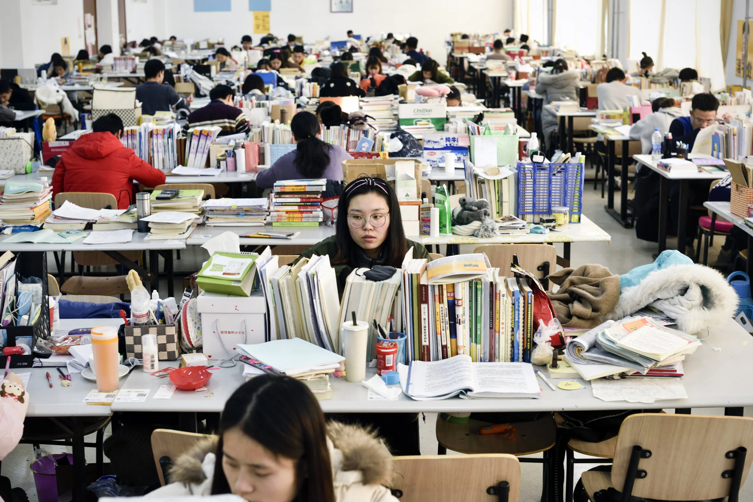  Jinan, 2019. Instead of going to class, college seniors spend eight or more hours a day cramming for graduate school entrance exams at Jinan Yingcai (Talent) University. A major part of the exams requires rote memorization of political thought, incl