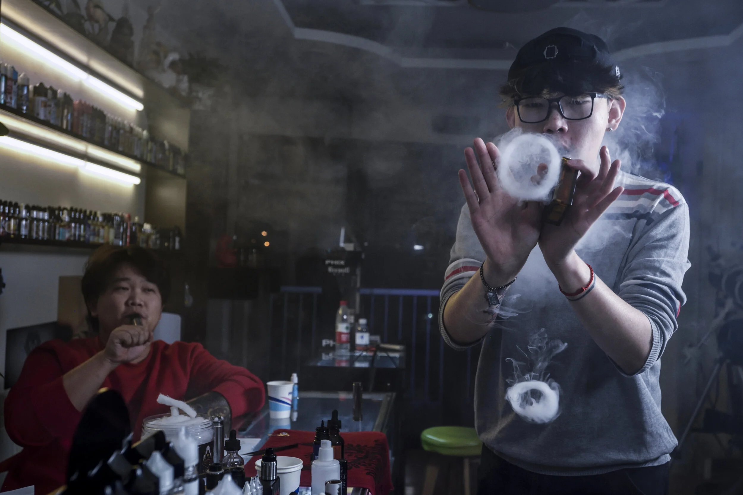  Beijing, 2018. Li Xiaotong, 26, and Tian Chen, 25, were vape hobbyists who decided to make a business of it, opening a shop in Beijing and also on Taobao.com. One characteristic of the young entrepreneurial generation is the willingness to quickly m