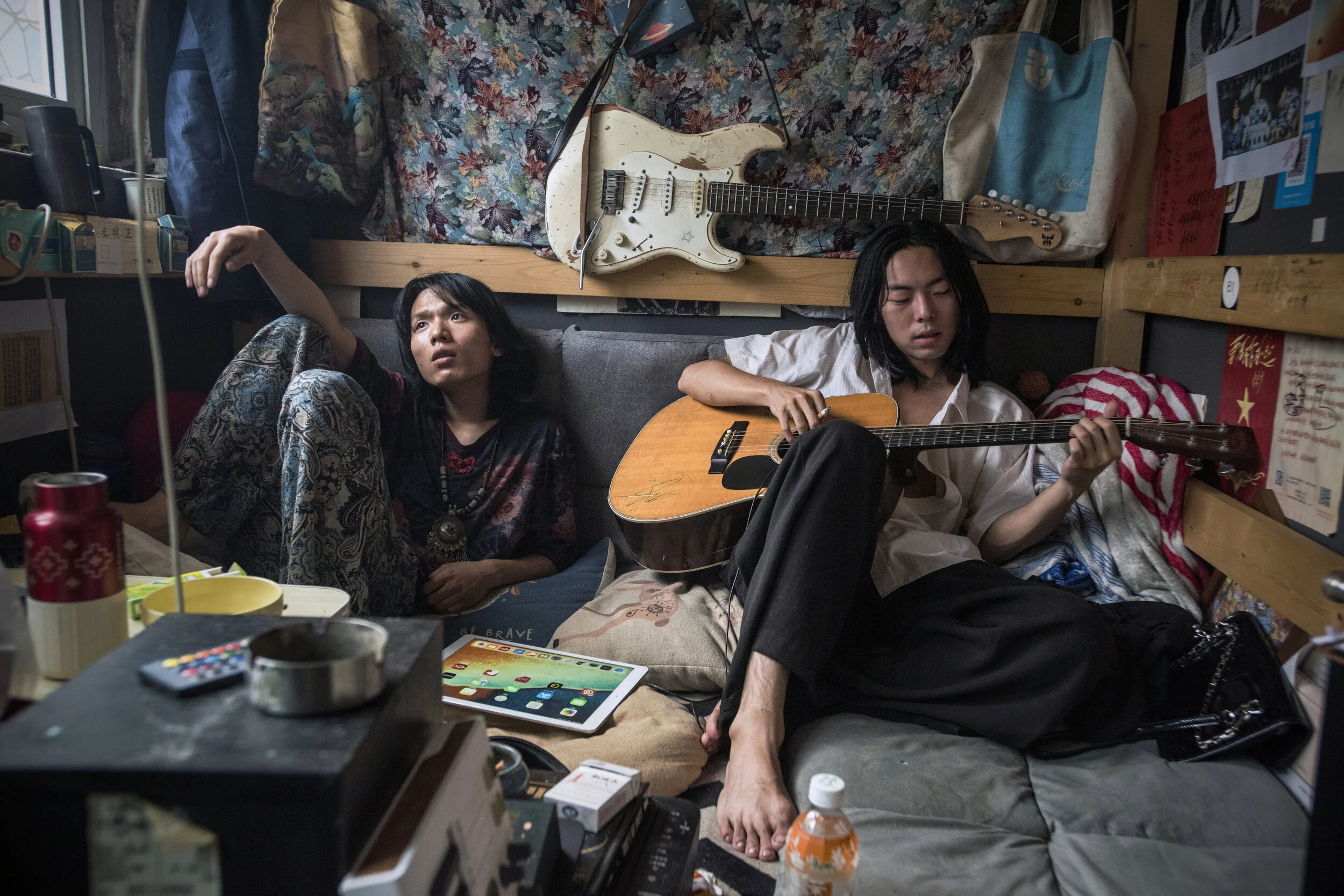  Beijing, 2019. Er Yang, 23, (with Liuzi, 21) makes a living playing blues and rock at bars. He studied information services at Beijing Technology University, the first one in his family to go to college. After graduation, he wrote blurbs of classic 