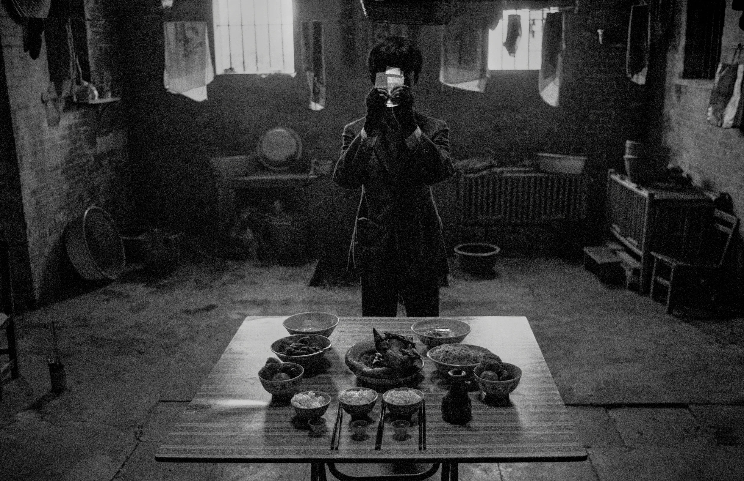  Taishan, 1990.  My cousin makes offerings to our ancestors to let them know I returned to the family village 