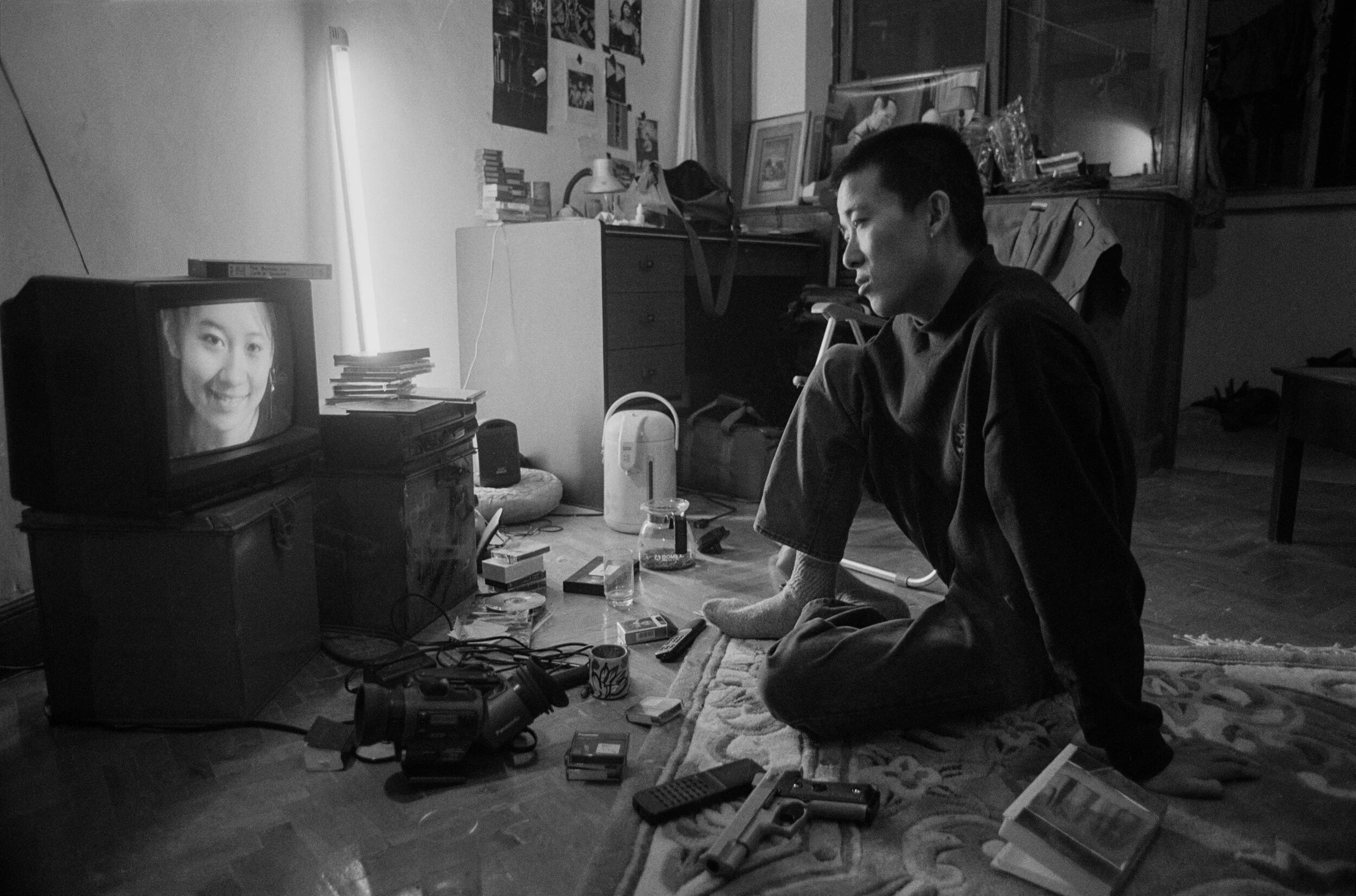  Beijing, 1997.  Documentary/art filmmaker Zhao Liang screens one of his experimental videos 