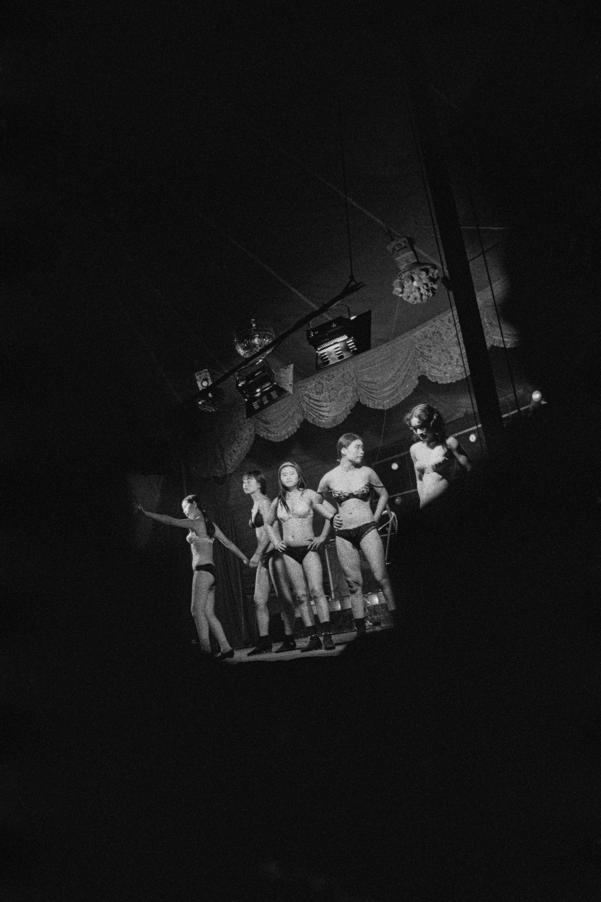  Zhejiang, 1997.   Performers in a rural tent peep-show that travels from town to town 