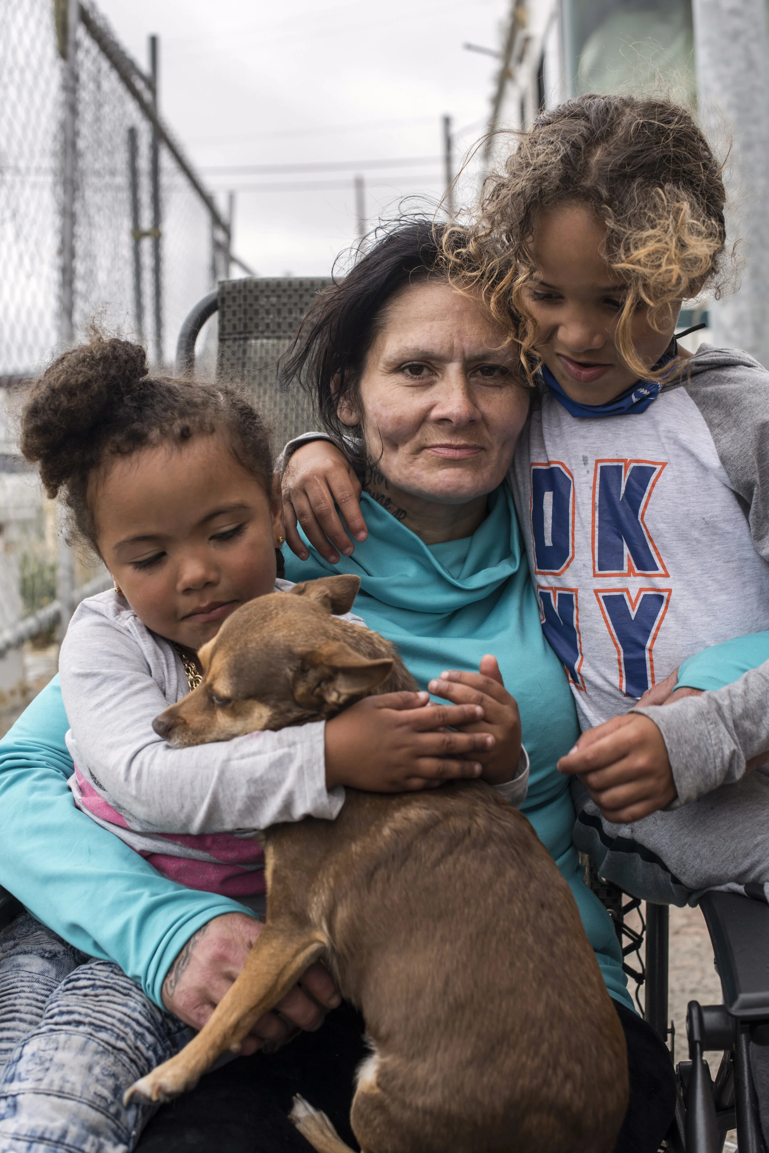 Oakland, USA.  Unhoused family living in a broken down mobile home (for National Geographic Society) 