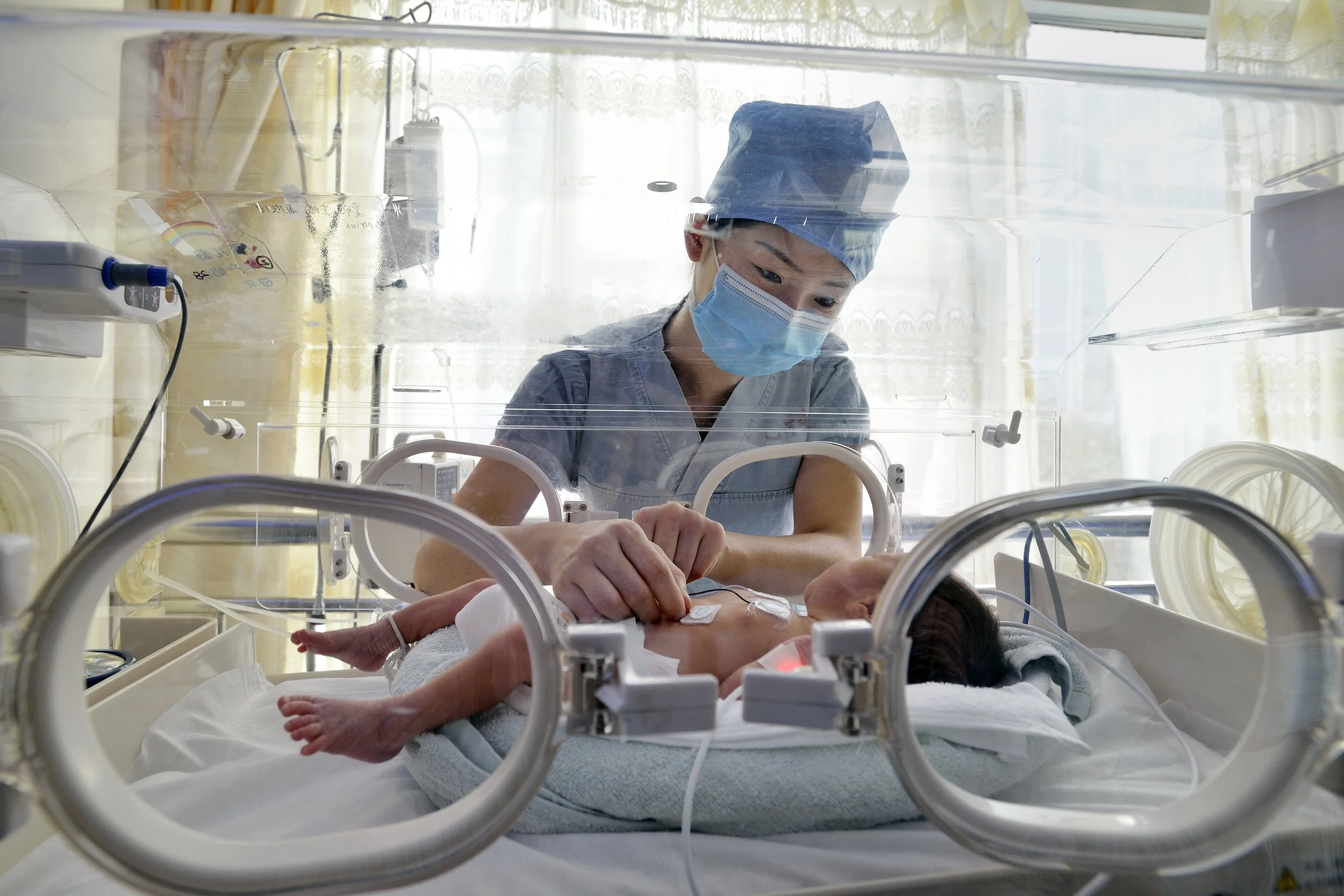  Beijing, China.  NICU nurse and newborn baby (for  Johnson &amp; Johnson ) 
