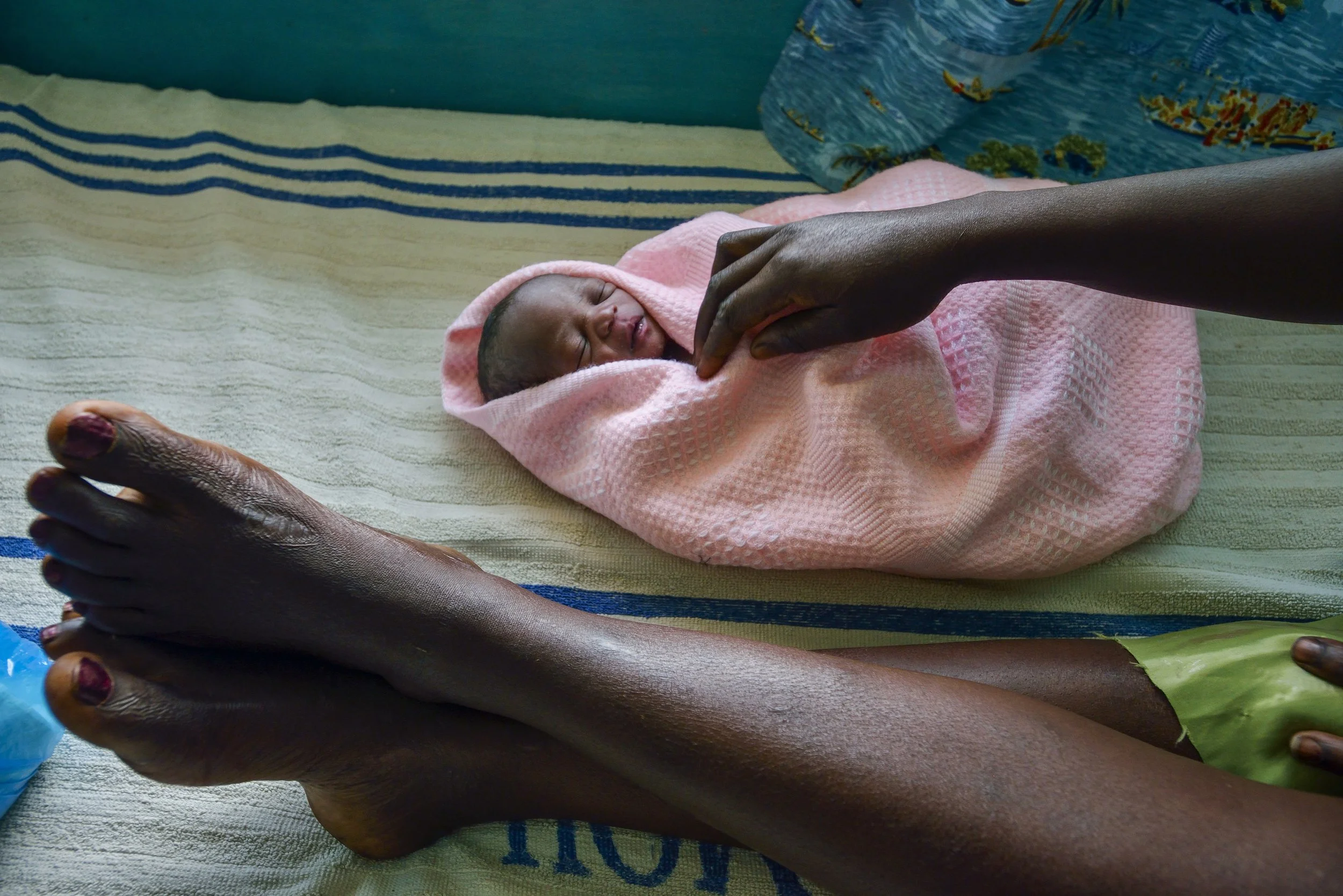  Mbale, Kenya.  Mother and child, supported by mother-infant mobile health program managed by the World Health Organization 