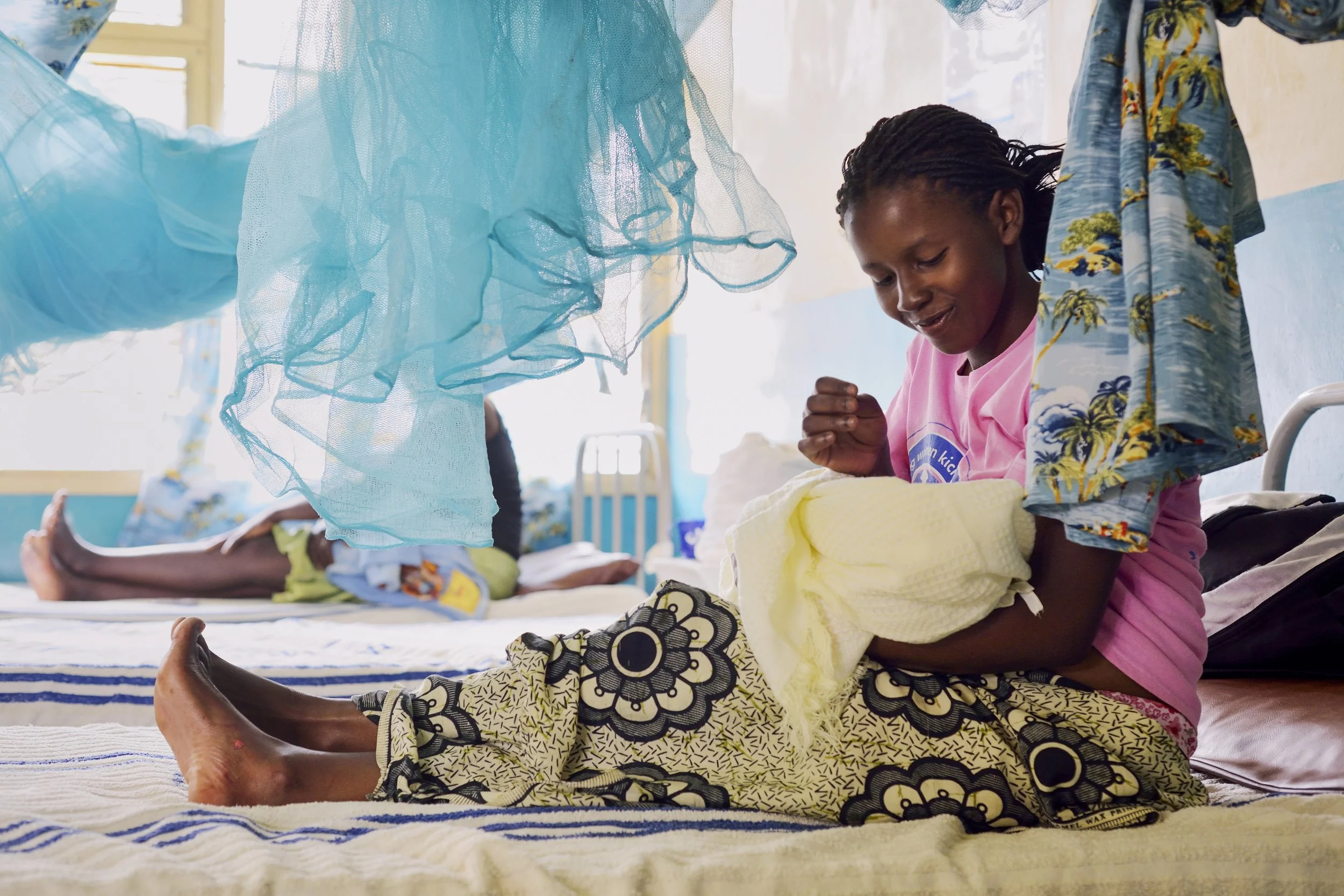  World Health Organization.  New mother supported by Changamka Microhealth maternal health voucher payment program.   Mbale, Kenya 