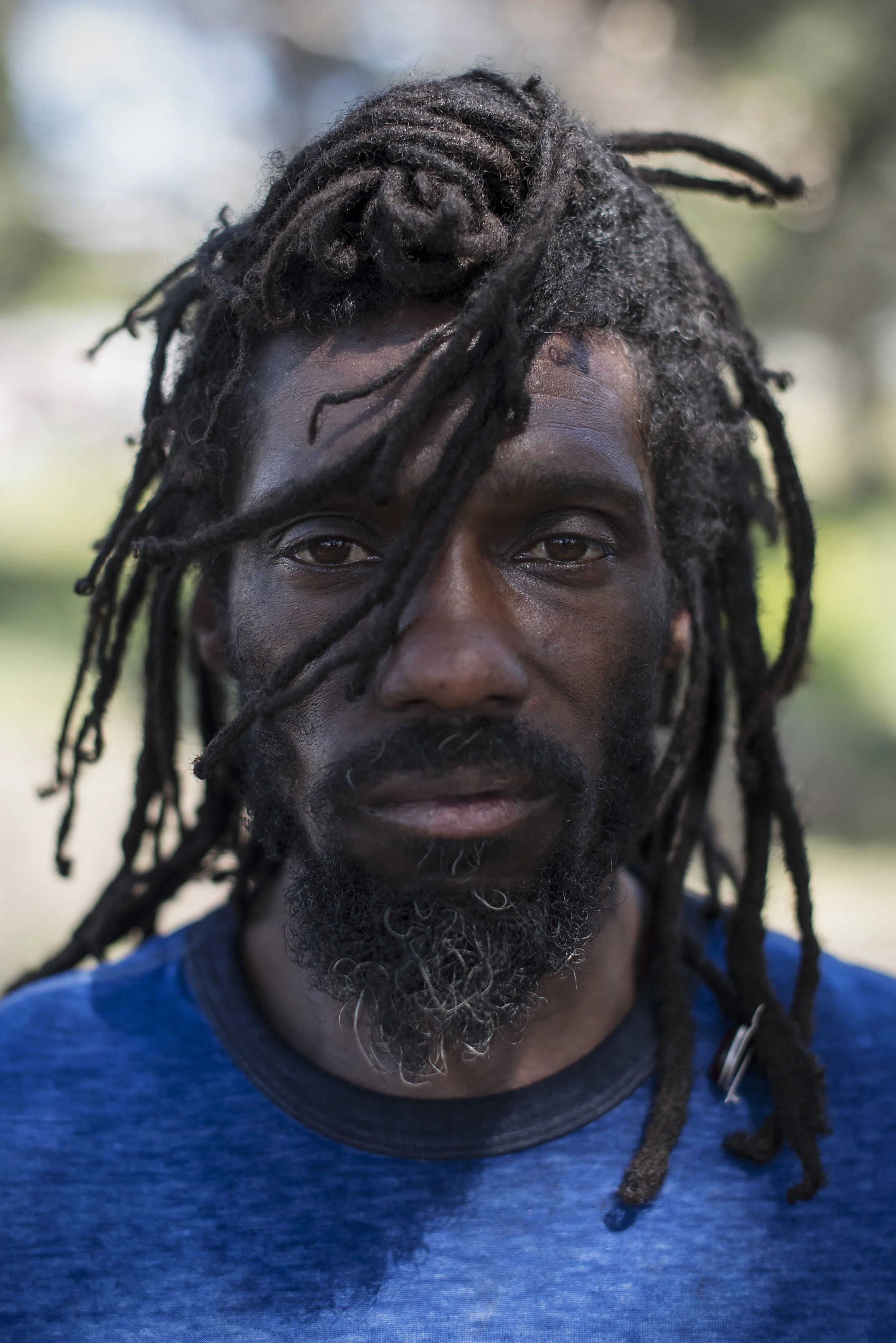  Berkeley, California, USA.  Unhoused man living on a freeway cloverleaf 