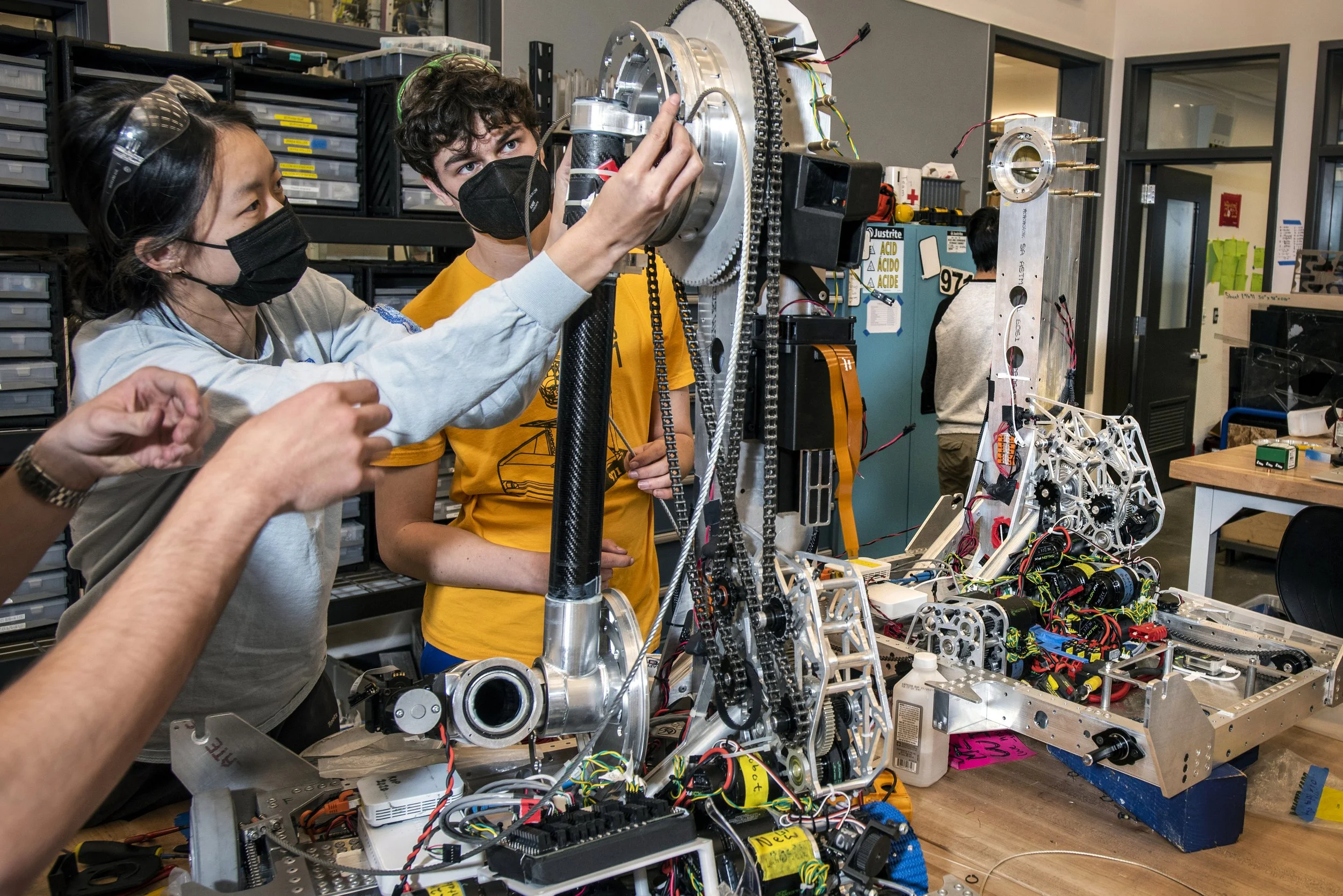  Members of the Mountain View High School 971 Spartan Robotics Team work on the final build for their robot.  Situated in the middle of Silicon Valley, with sponsors like Google, Intuitive Surgical and John Deere and local mentors deeply embedded in 